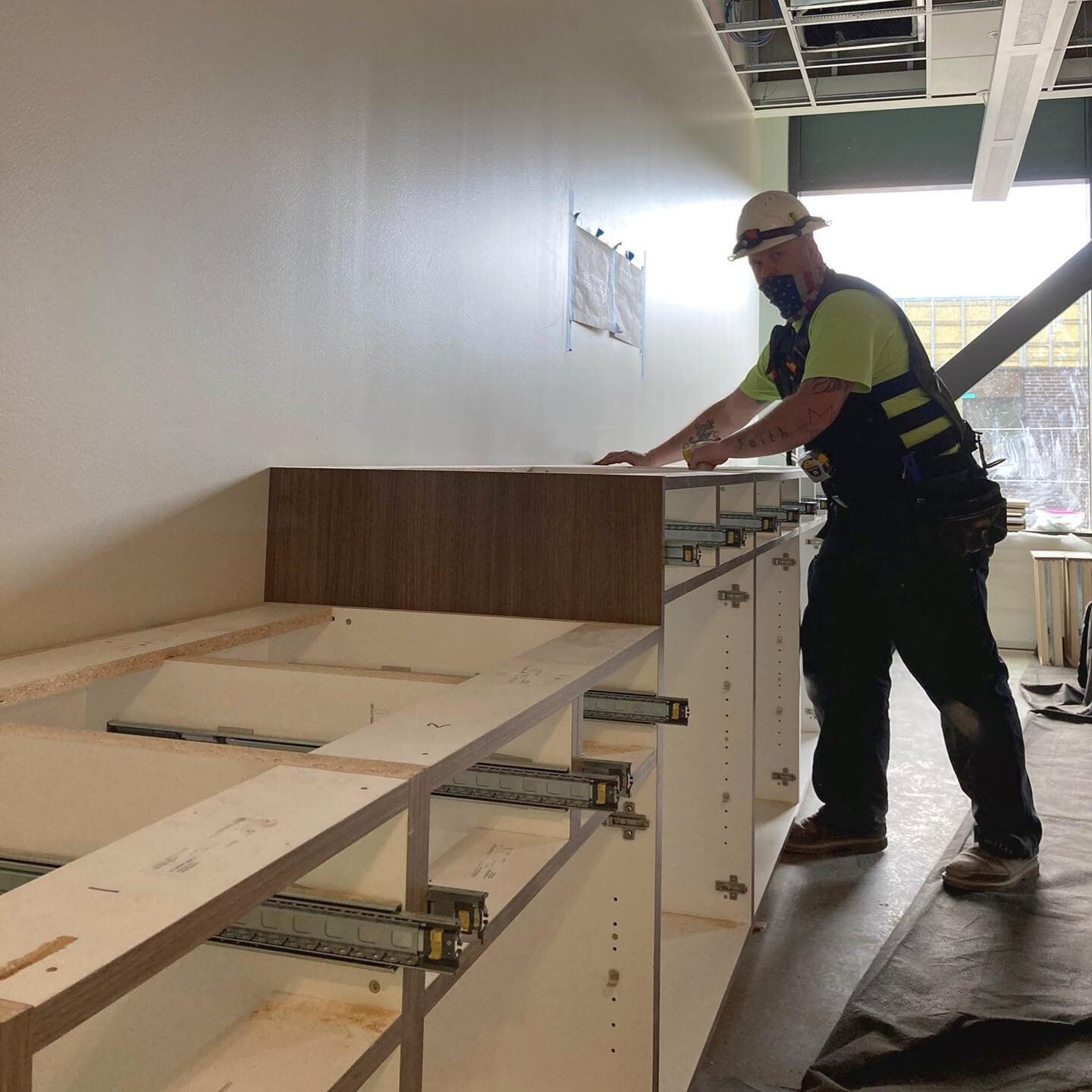 Evergreen Public Schools &ndash; Admin Building, installing some cabinets &ndash; Hi Dan! Thanks Travis for sharing the update, great work team. #Emerick #EmerickConstruction #SafetyFirst #EvergreenPublicSchools @evergreen_public_schools