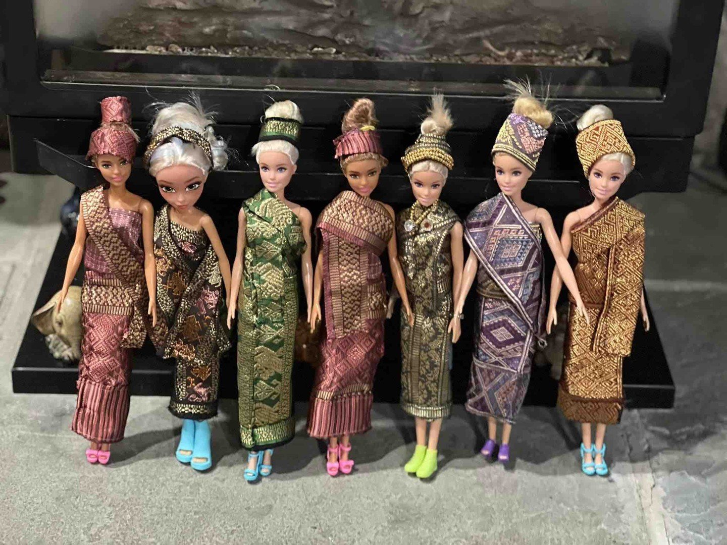 A grandma from Erie, PA created Lao traditional silk costumes for each of her granddaughters Barbie dolls. What a fun way to incorporate culture into everyday play. Hmmm, could there be there a small online business opportunity happening in the futur