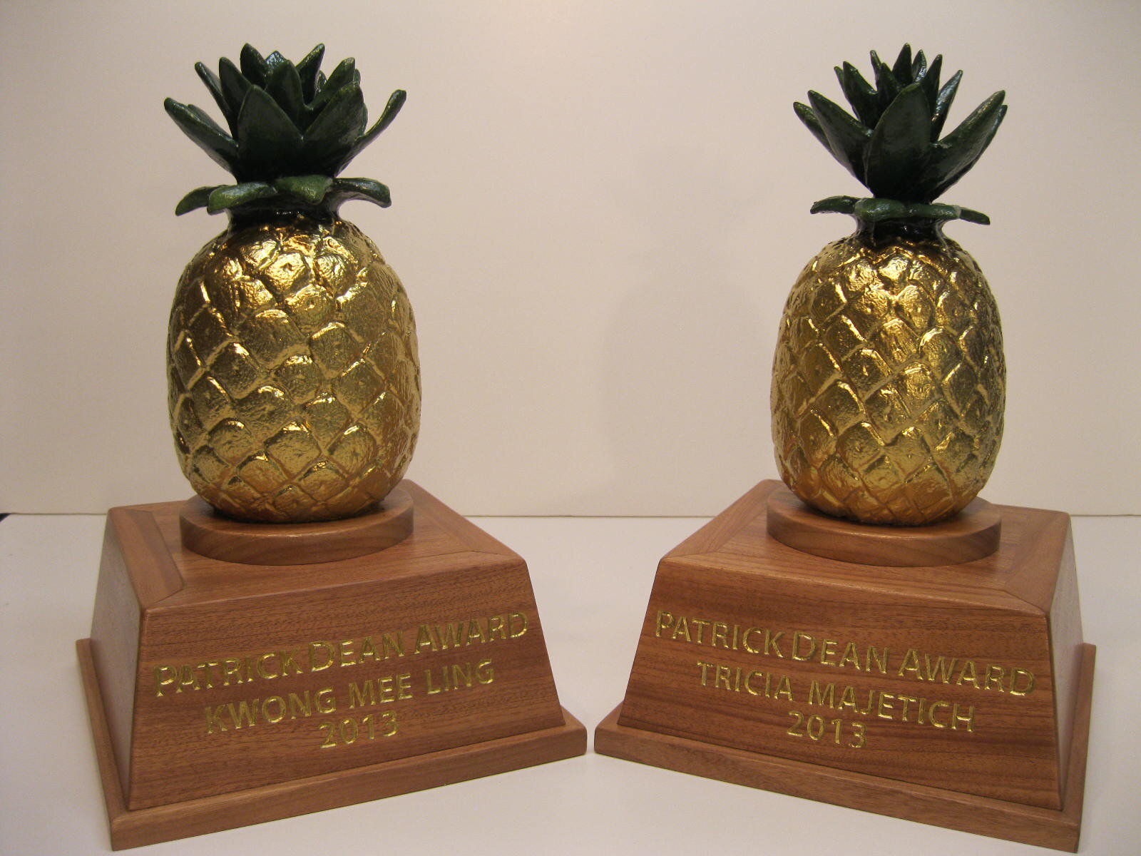  Annual corporate award. Hand sculpted pineapple,  carved name &amp; date on to a mahogany base. Base fabricated by Rick Deziel  