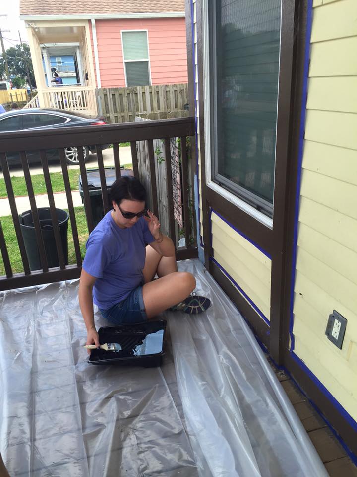 Colleen putting the finishing touches on the trim of this home.
