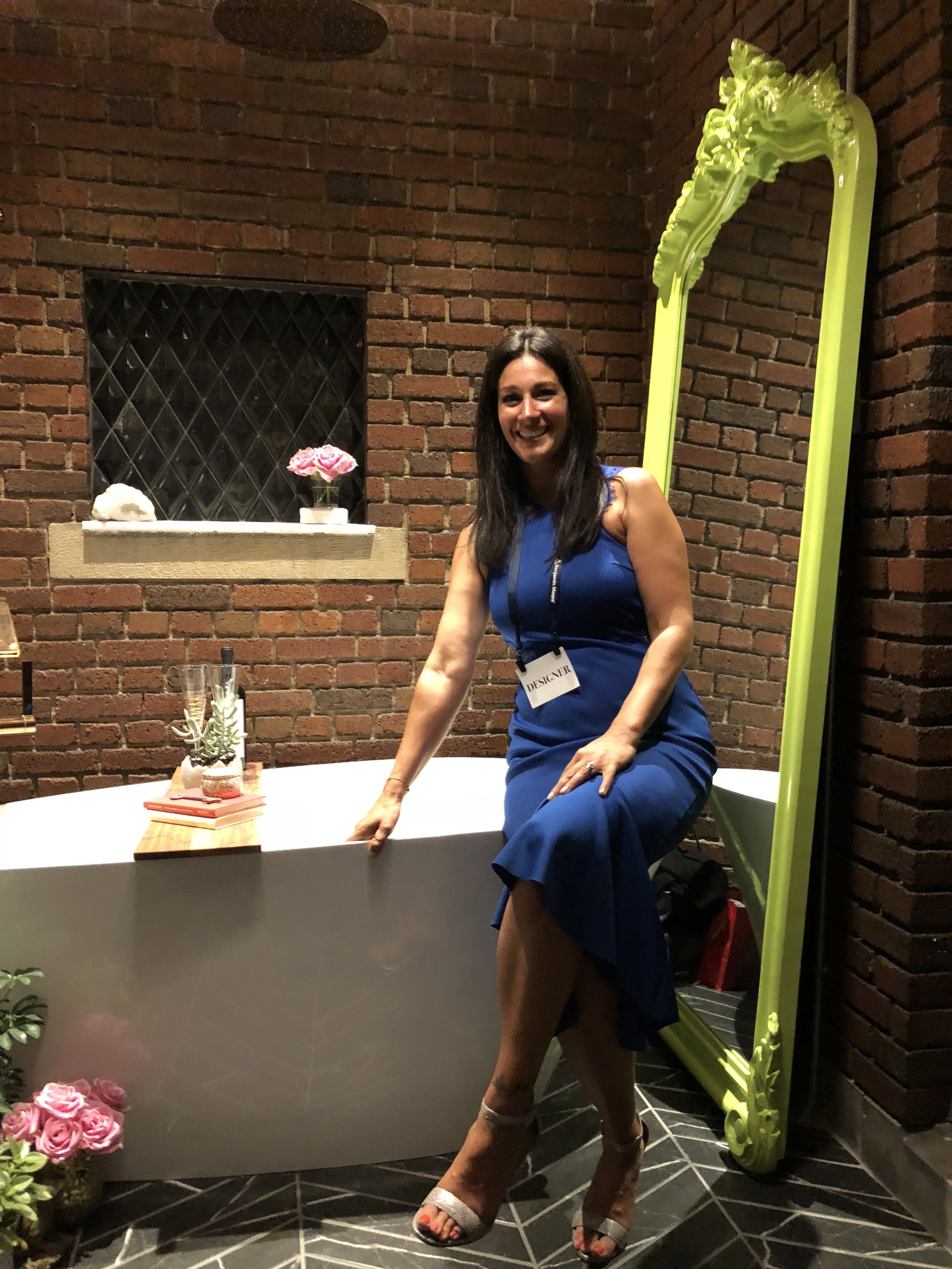 Kristen Eleni Shellenbarger of Iron Key Designs in her Garden Bath by our Green Tudor Mirror