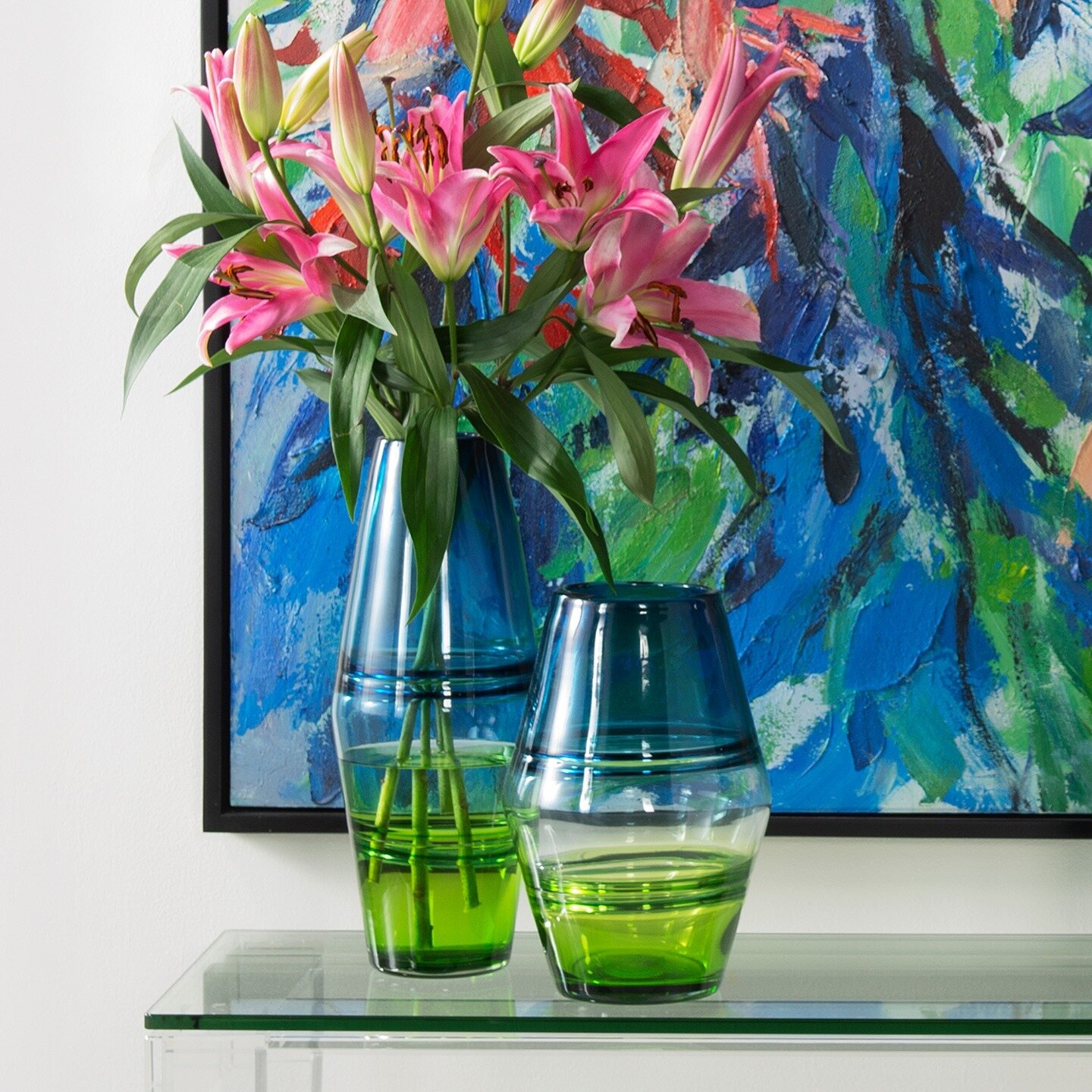 Live in Color!

It seems like such a simple thing, but ever notice the feeling you get when you enter a room with fresh flowers, or pops of color in the decor?

If you love color, this is the vase for you! The transparent coloring allows for the ligh