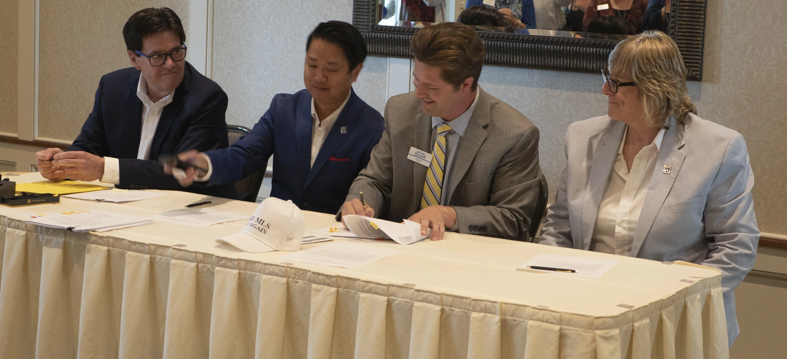 (Left to right): John Mosey (NorthstarMLS President/CEO), Man Huynh (SPAAR President), Jay Jewson (SEMR President) and Kath Hammerseng (MAAR President)