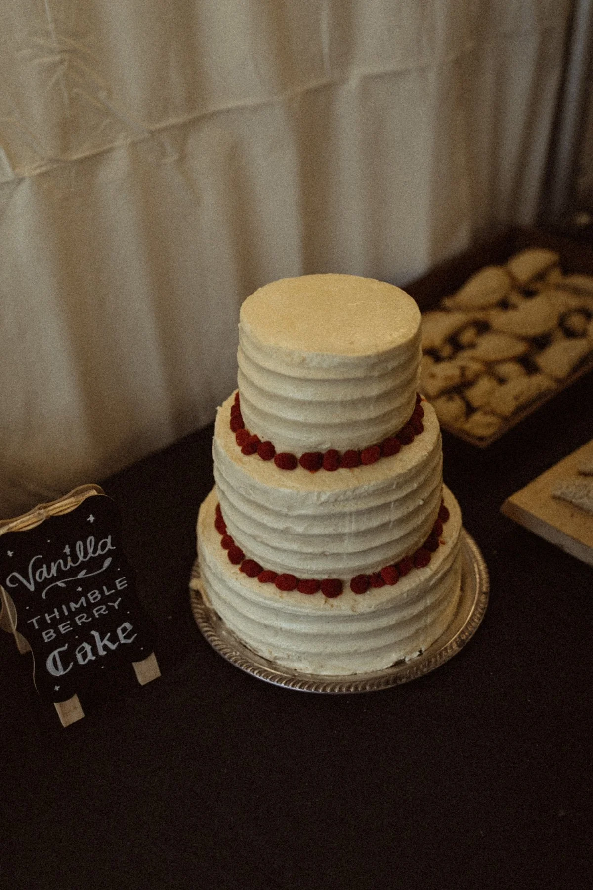 Wedding chalkboard sign for vanilla thimbleberry cake