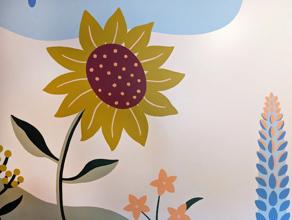 Abstract, modern floral nursery mural in Michigan with sunflower, echinacea, and lupine.