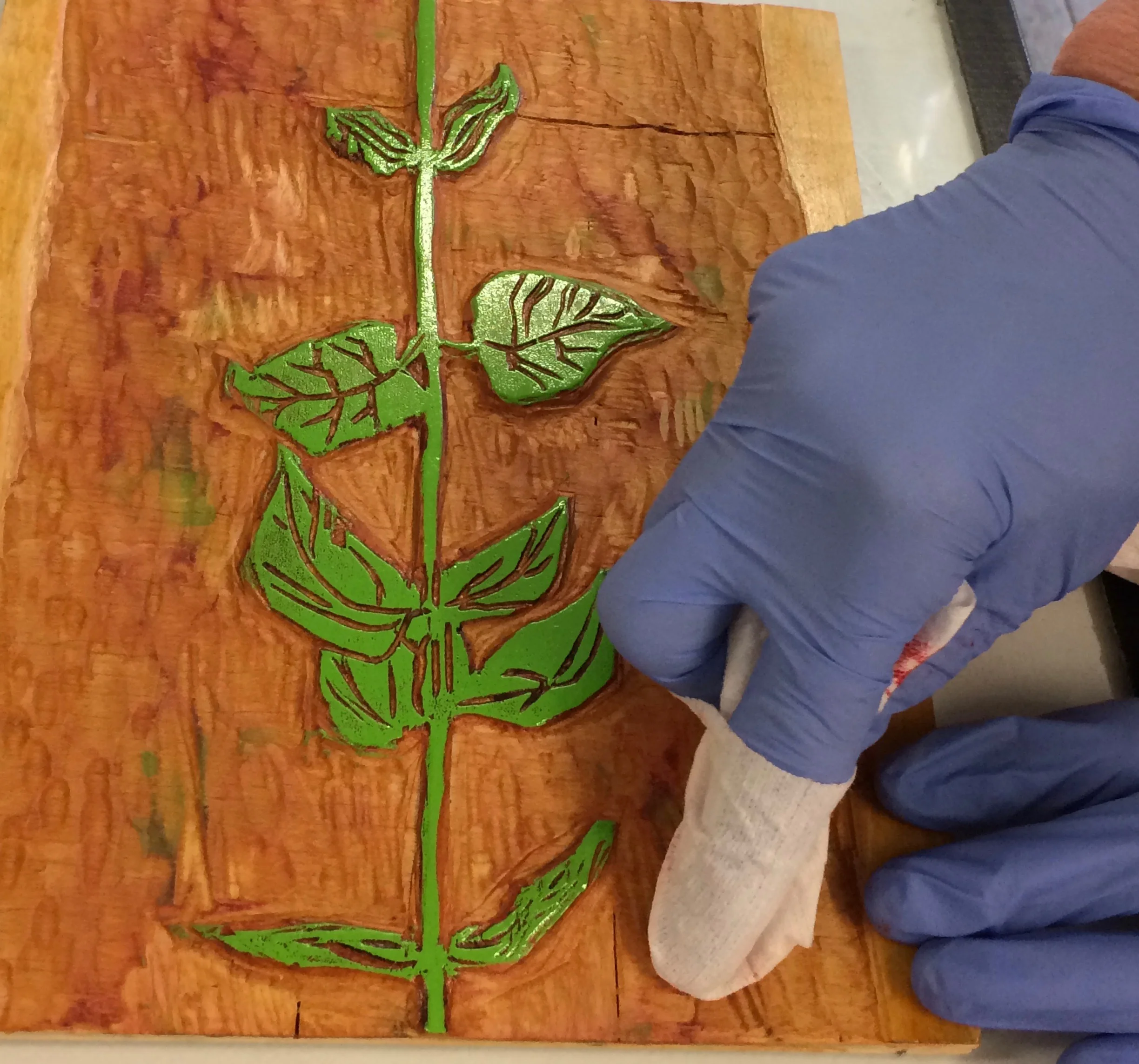 woodcut block being cleaned right before printing