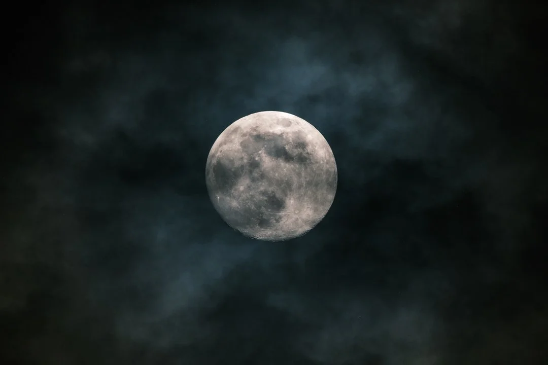 2024 Moon Behind Clouds