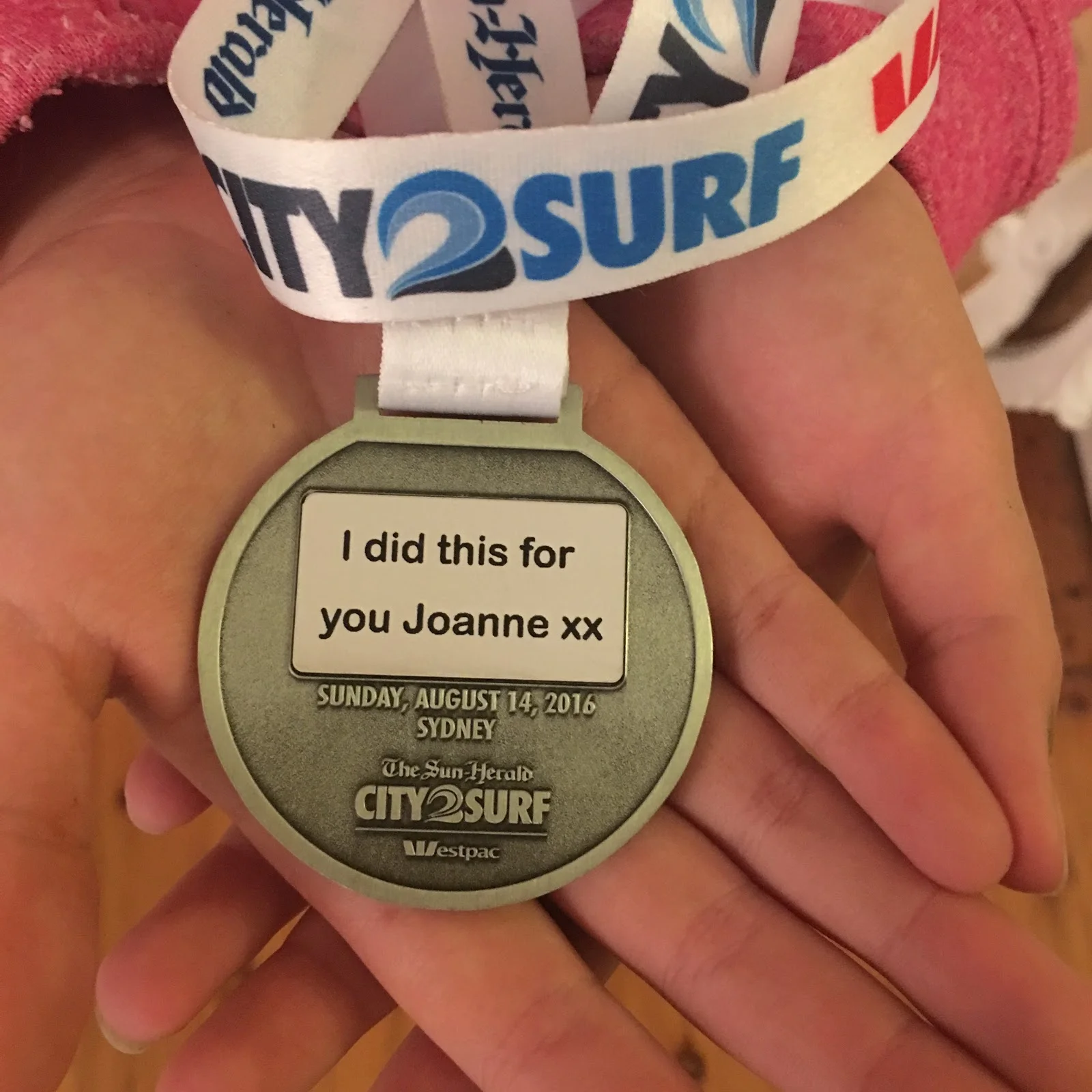 Eden gave her 2016 City2Surf medal to Joanne's mum.