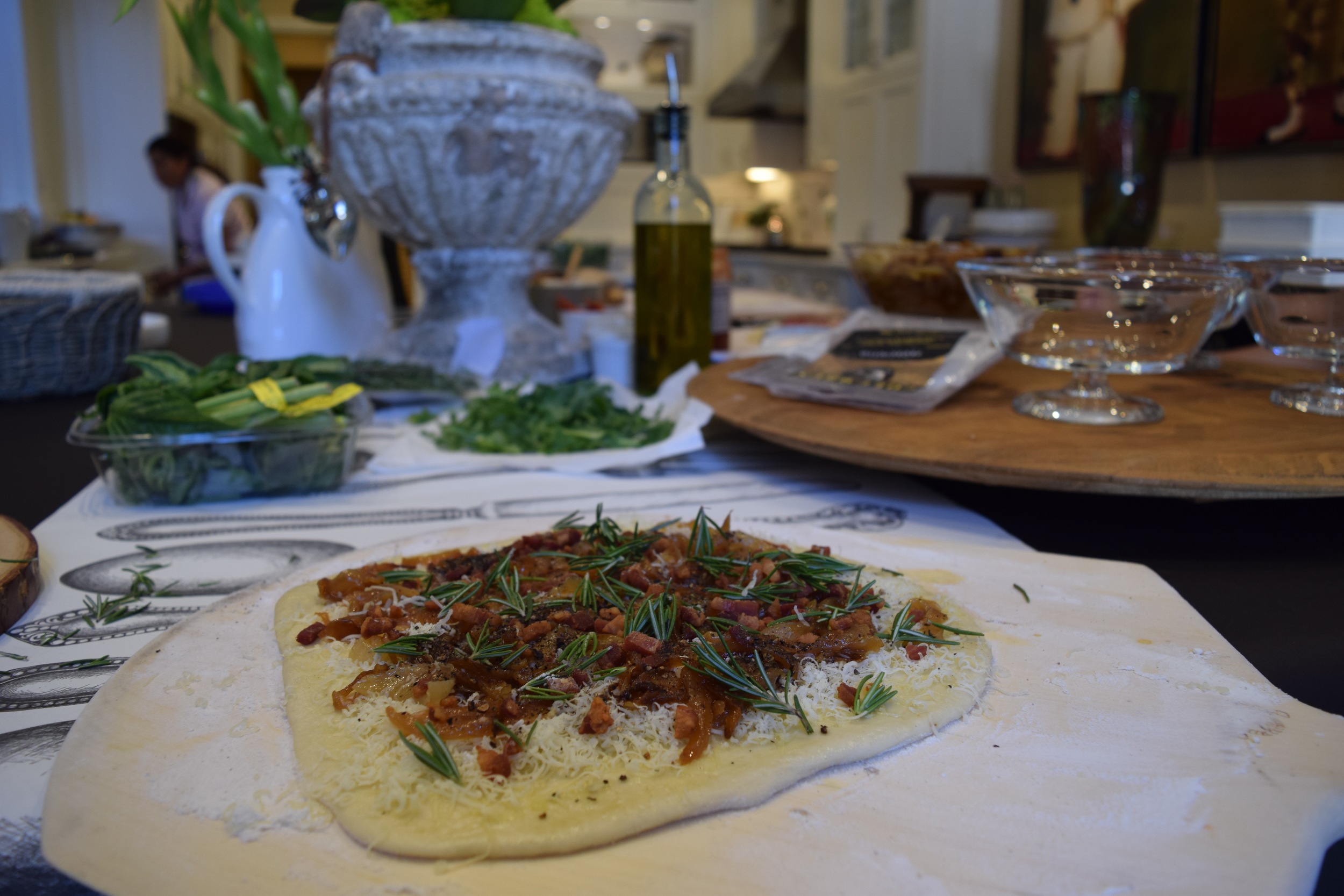 The Henry Family favorite pizza: gruyere cheese, pancetta, caramelized onions and rosemary