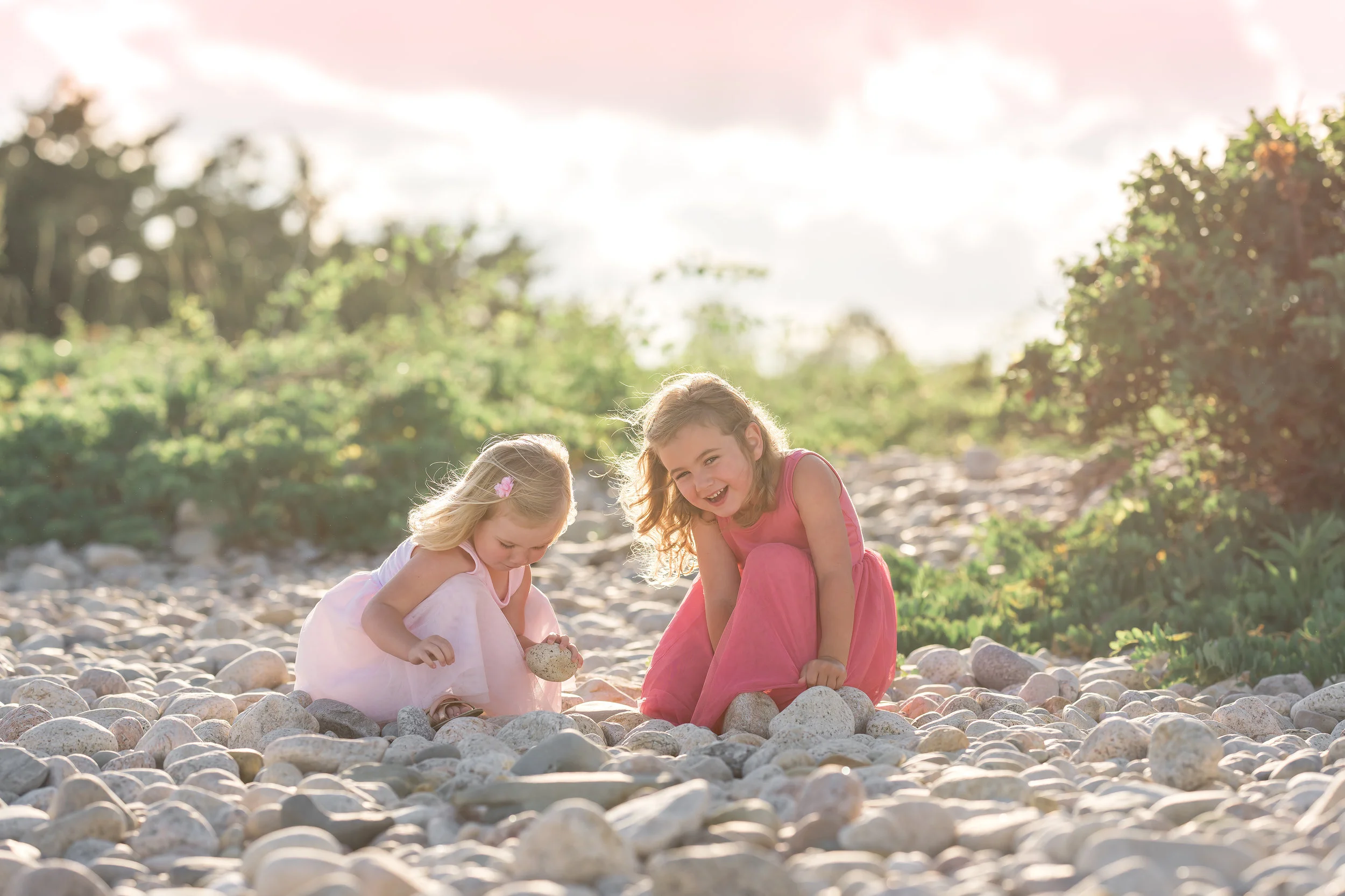Except for a bit of wind, it was a perfect night. They had called for rain but we certainly lucked out with clear skies. After a little walk, we found just the right spot for the girls. We had a mix of these gorgeous river rocks as well the ocean.