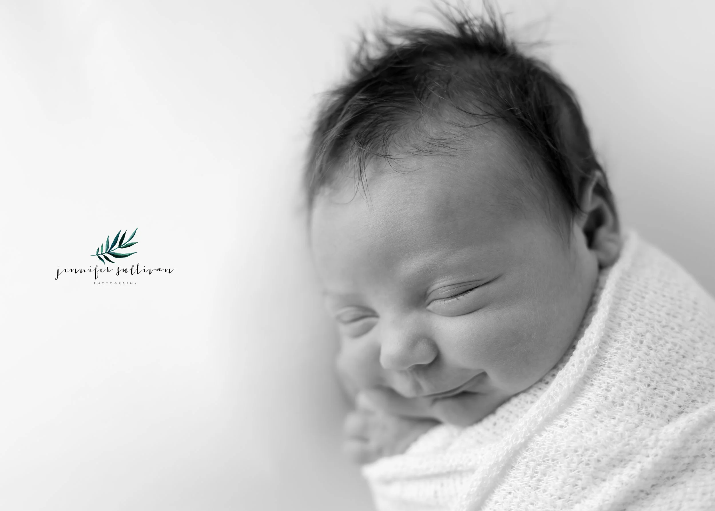 LOOK AT THAT SWEET LITTLE FACE! I LOVE IT WHEN I CATCH A SMILE. I ALWAYS WONDER WHAT THEY COULD BE THINKING ABOUT OR DREAMING ABOUT AT JUST A FEW DAYS OLD. AND JUST TAKE A MINUTE TO CHECK OUT THAT HAIR! SEE HIS LITTLE HANDS CURLED UT TO THE SIDE OF HIS FACE…HE LIKED THEM THERE. EVERY BABY HAS A SPOT WHERE THEY ARE COMFORTABLE. I LOVE THAT ABOUT THEM AND HOW THEY ARE ALL DIFFERENT. THERE ARE SOME BABIES THAT I COULD JUST PHOTOGRAPH ALL DAY LONG AND REGGIE WAS ONE OF THEM BUT SOMETIMES I JUST HAVE TO MAKE MYSELF STOP. I HOPE YOU ENJOY SOME HILIGHTS FROM REGGIE’S SESSION.
