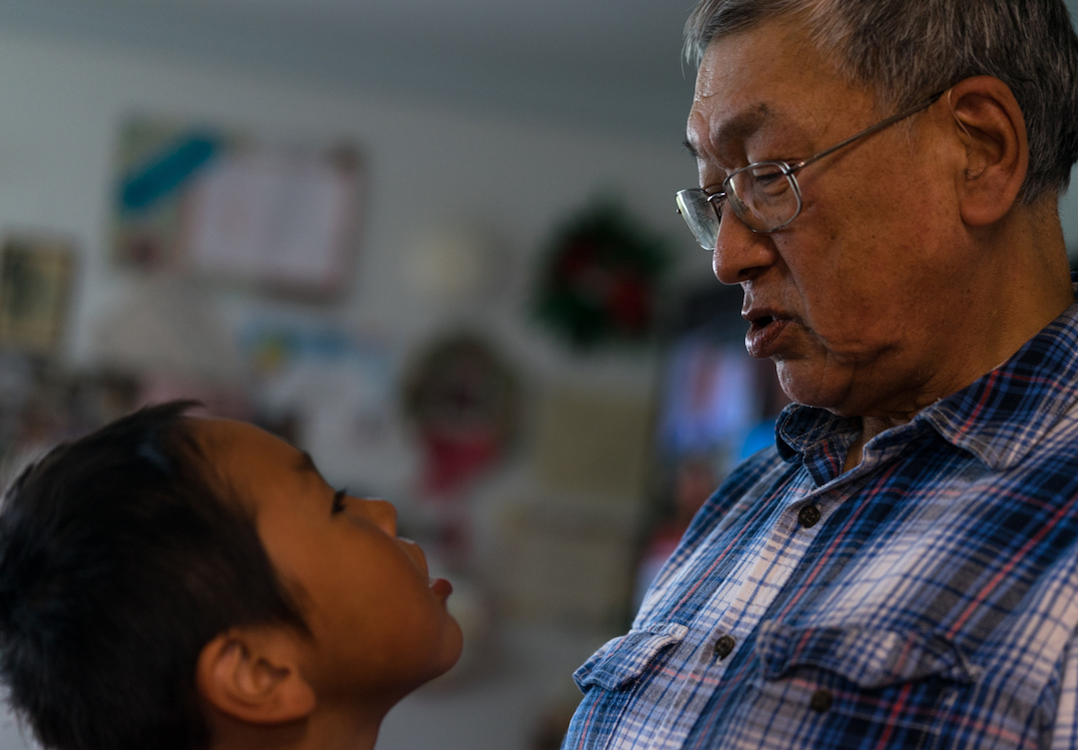 Walter Nayokpuk and his father, Percy, in their home