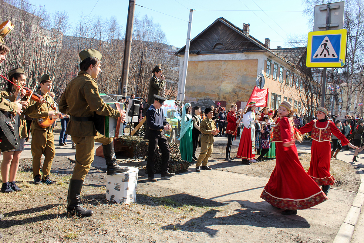 Local students perform for the Victory Day celebration.