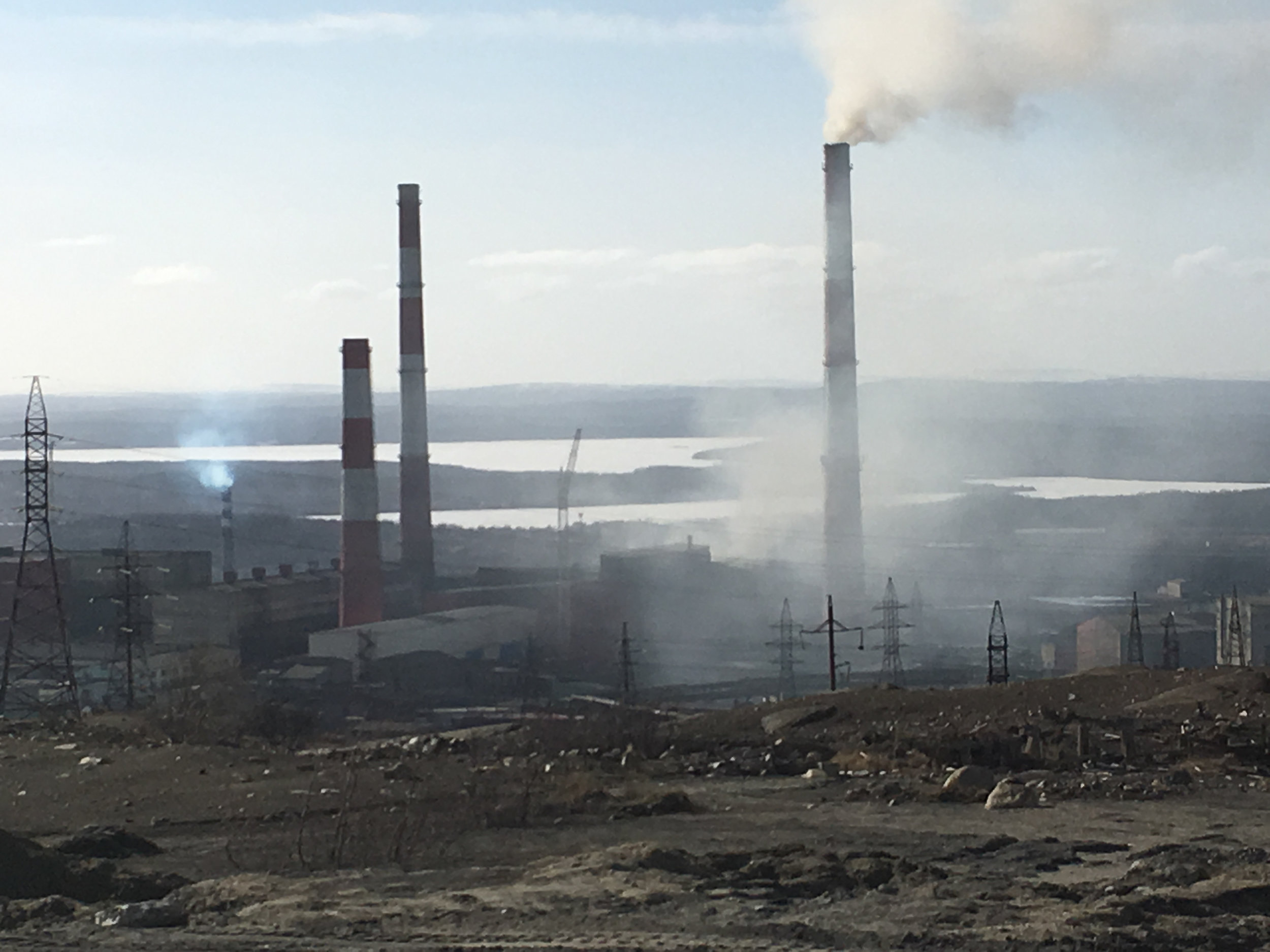 The smelting plant in Nikel is so old, the pollution billows out of the plant itself, in addition to the smokestack.
