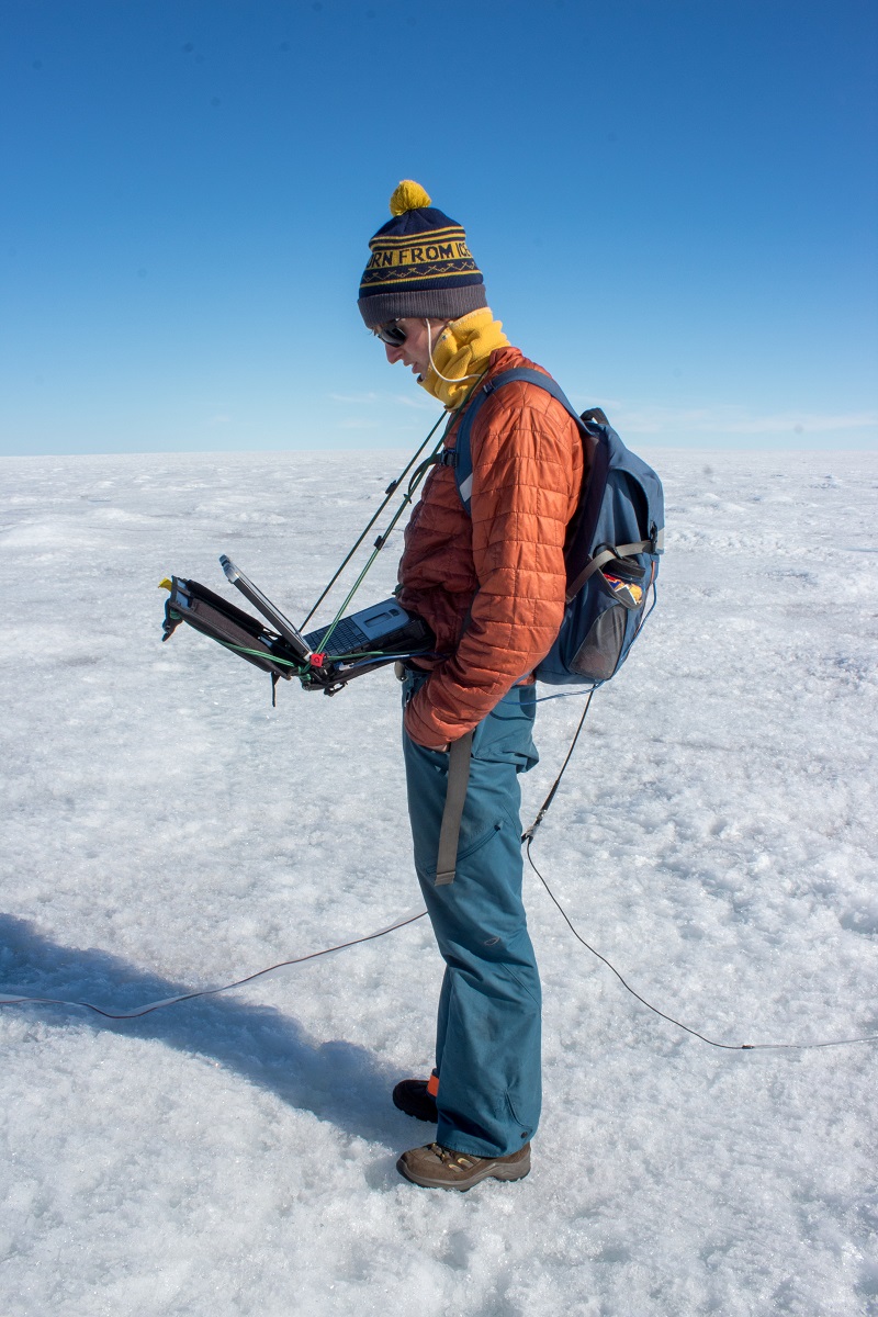 Student Aidan Stansberry collects data to help map the ice sheet bed.