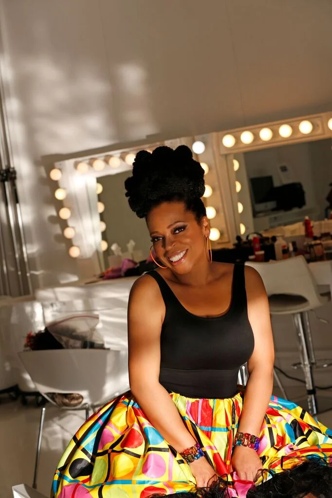 Fun shirt sitting in front of lights.jpeg