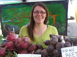 Amy selling beets at a farmer's market in Washington, where she spent a season working on an organic vegetable farm. You can find her this summer at the Fox Point Farmer's Market outside Milwaukee.