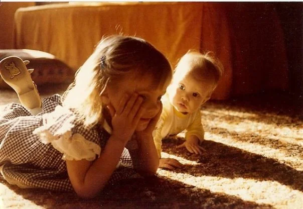 Teresa as a girl wth her sister