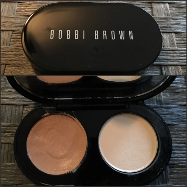    Bobbi Brown Creamy Concealer Kit     Description:    The Creamy Concealer Kit is a best-selling compact that includes Bobbi's yellow-based Creamy Concealer to instantly camouflage under-eye darkness and Pressed Powder to set the concealer for long