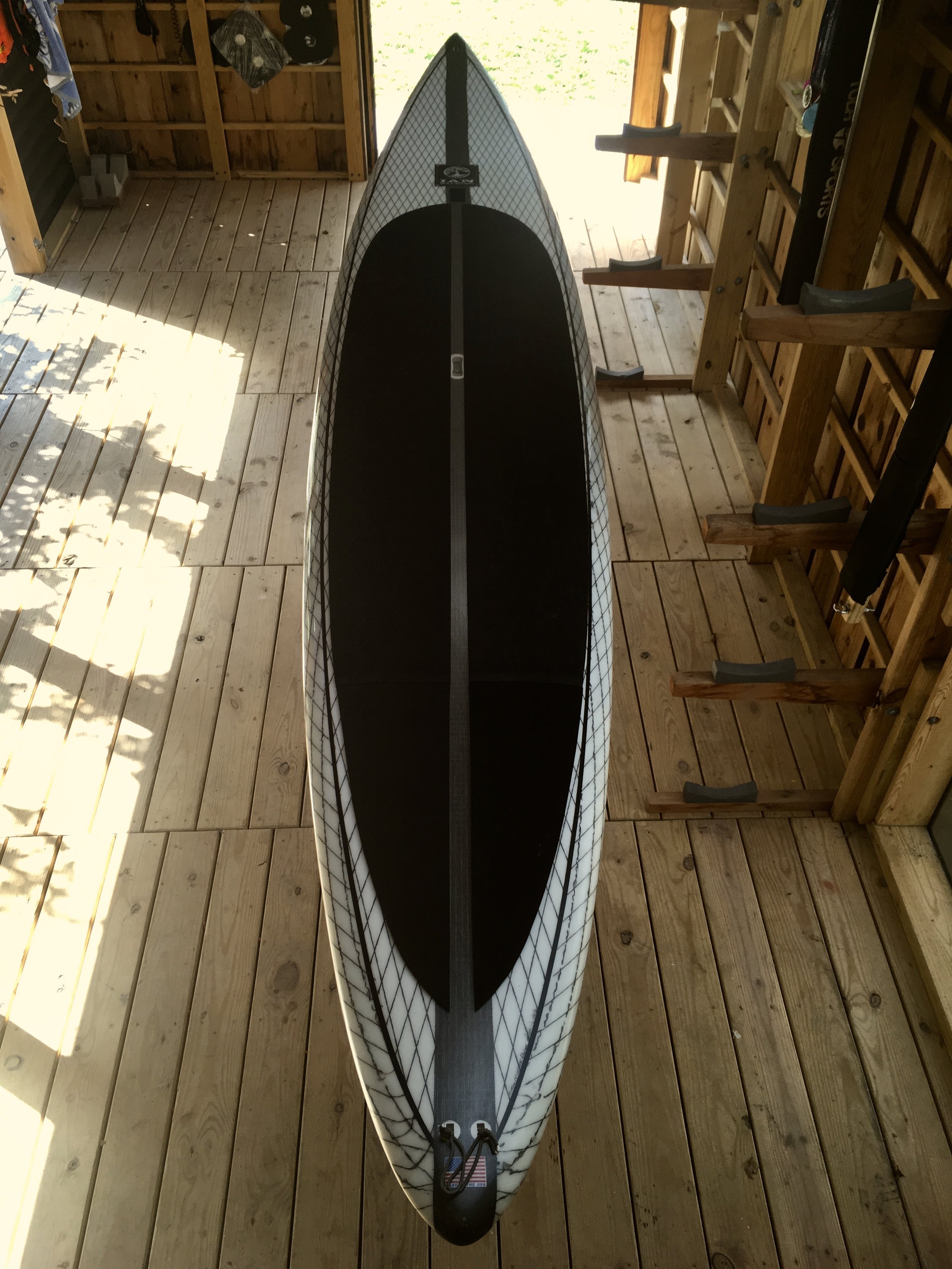 We had just finished the “Great Hall of the Longboats” and a picture of South Carolina custom shaper Ian Balding holding out the first one of these boards popped up in my facebook feed (posted by the Distressed Mullet). Like some art freak that sees the perfect Jackson Pollock for their study I HAD TO HAVE ONE!!