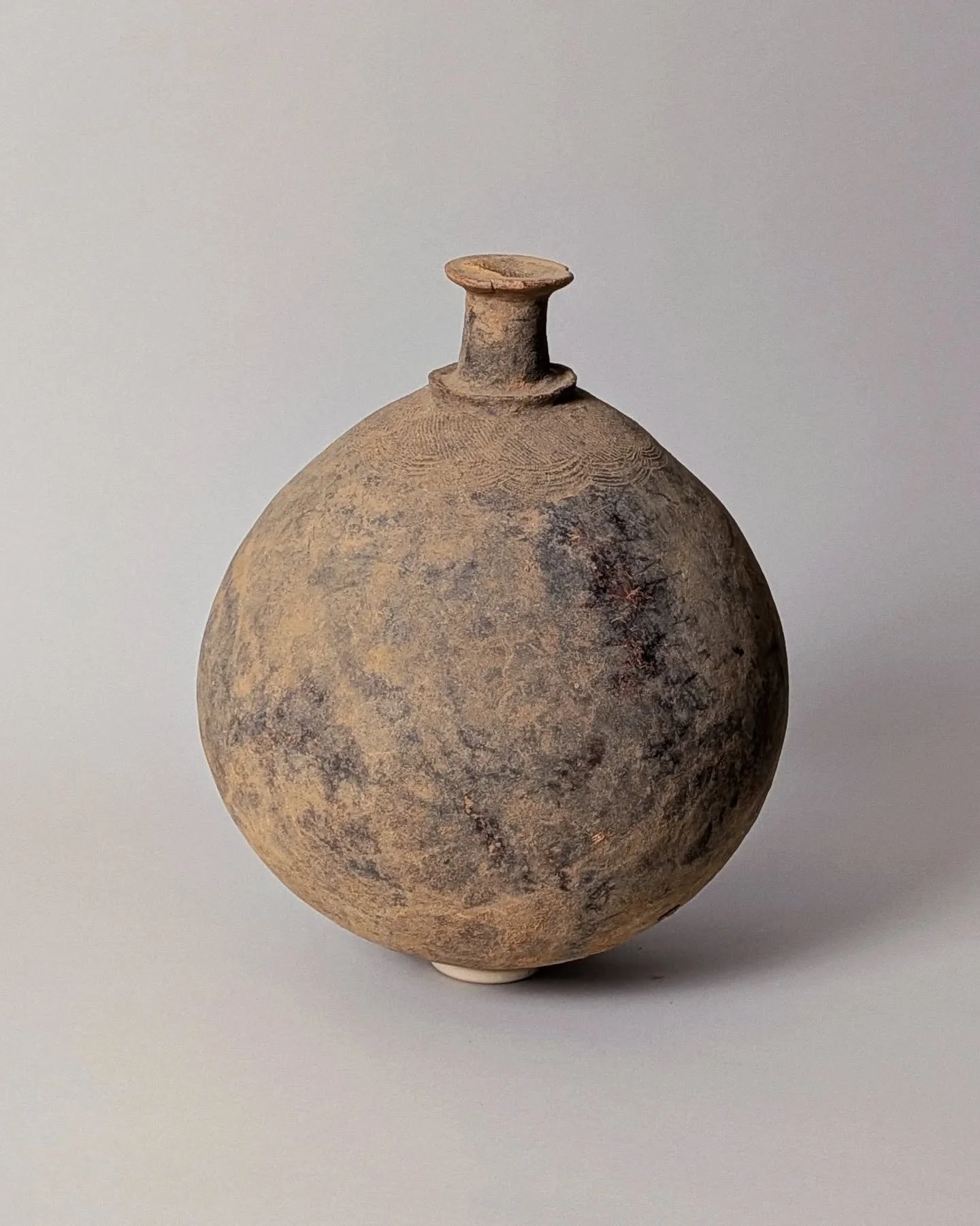 A beautiful antique vessel made in Djenn&eacute;, Mali. Using techniques and skill passed down through generations of women. 

Available online.