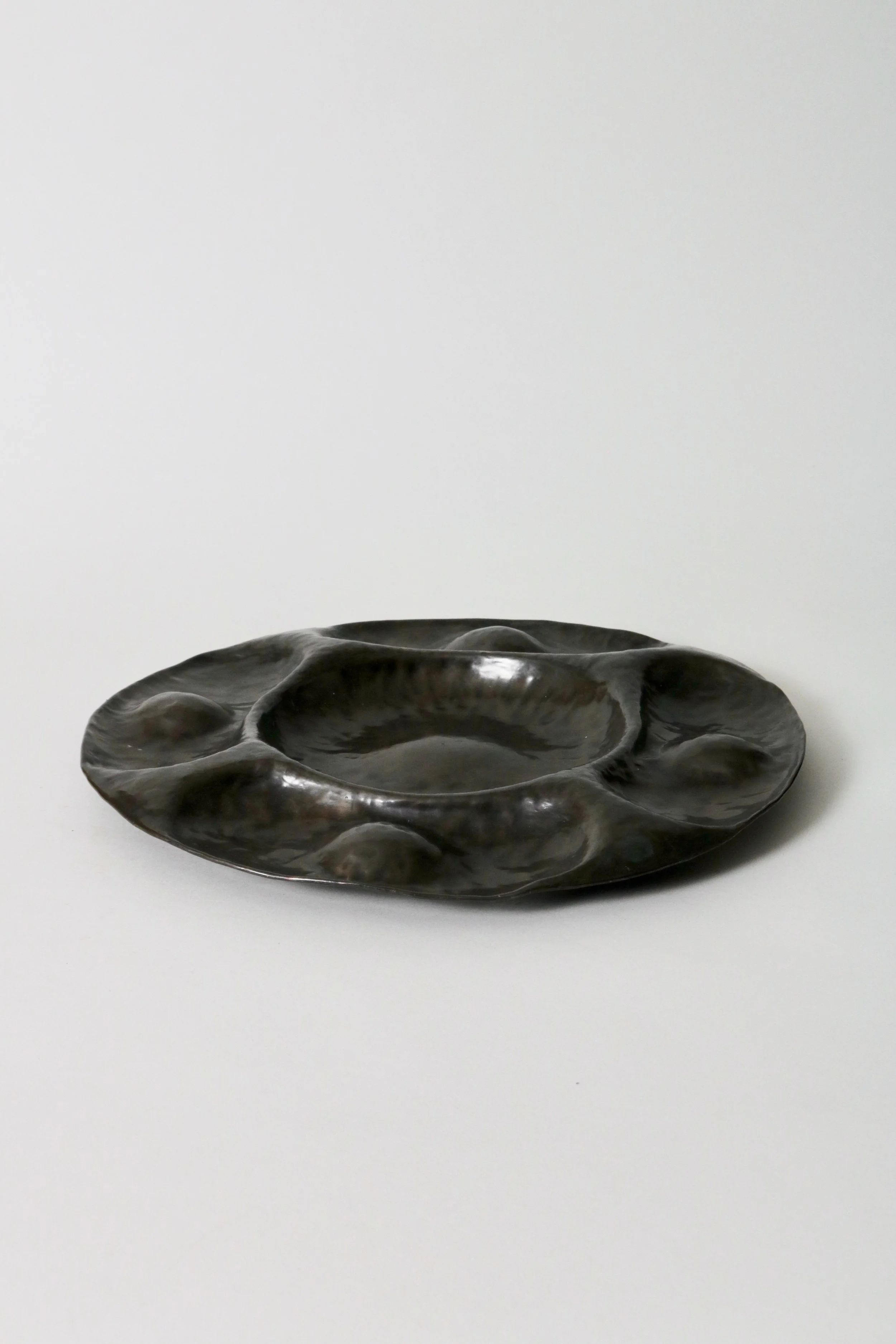 Hammered metal plate