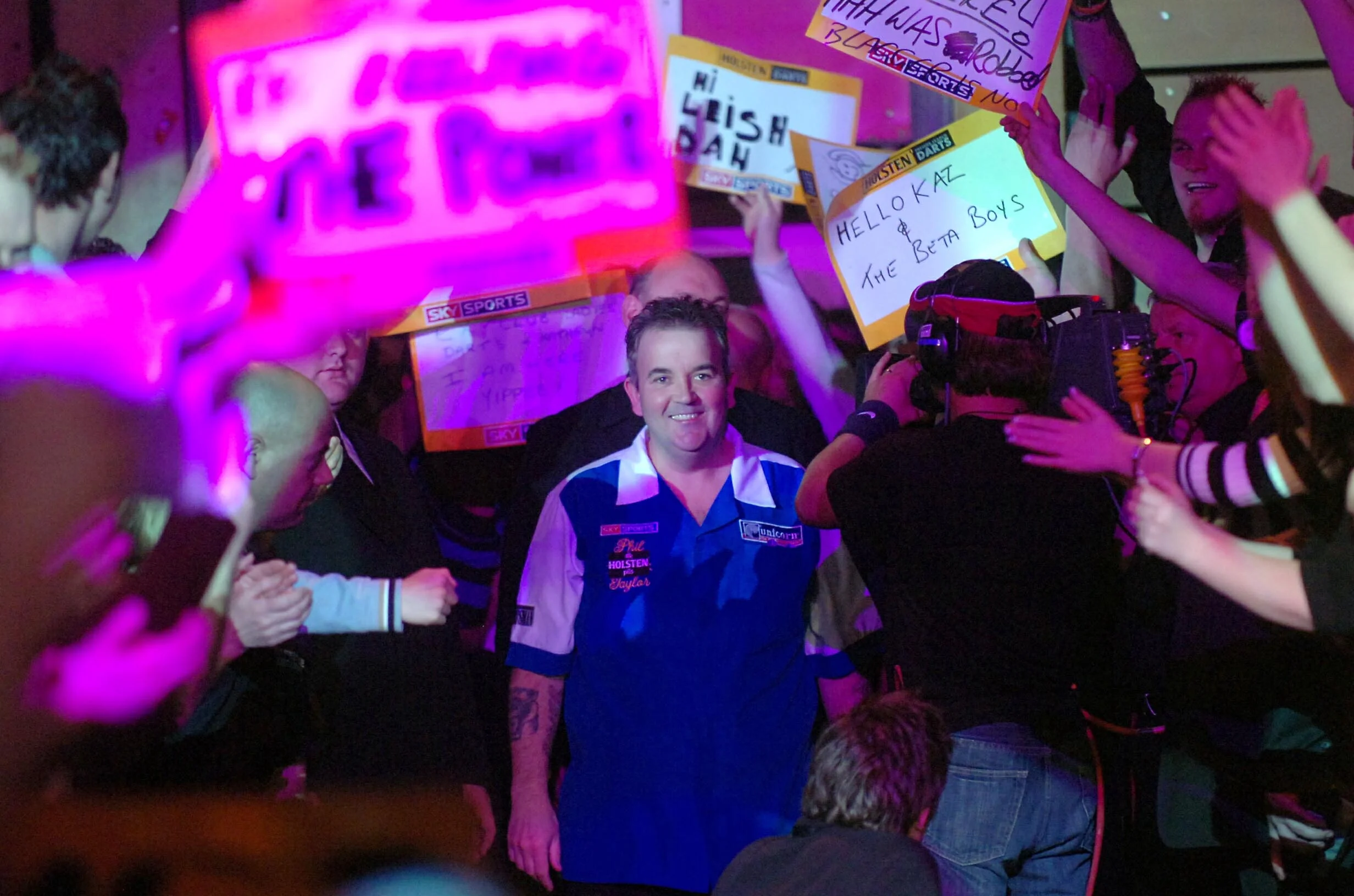 Phil "The Power" Taylor enters the arena
