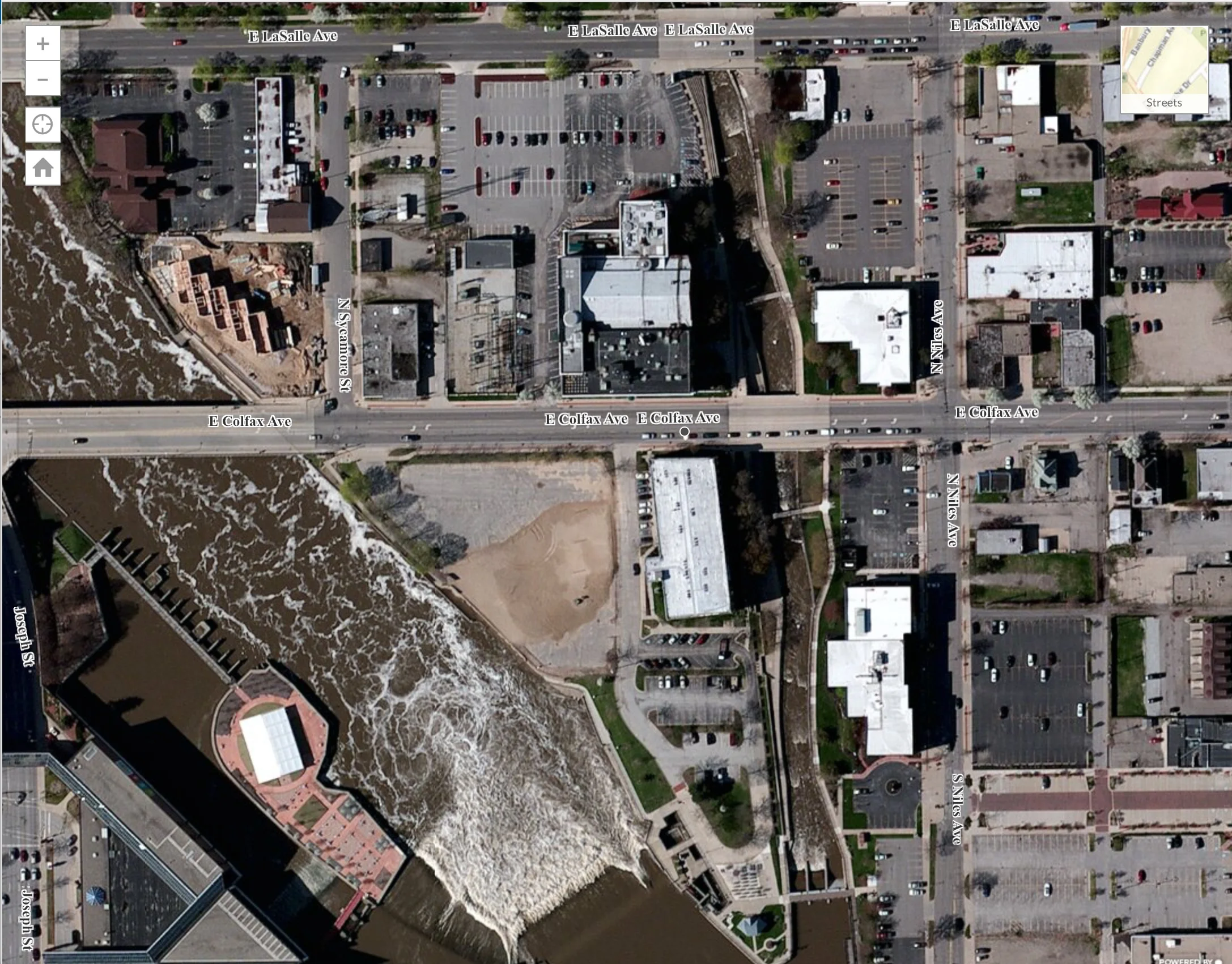 The relevant lot is between Lasalle and Colfax, just west of the East Race River.