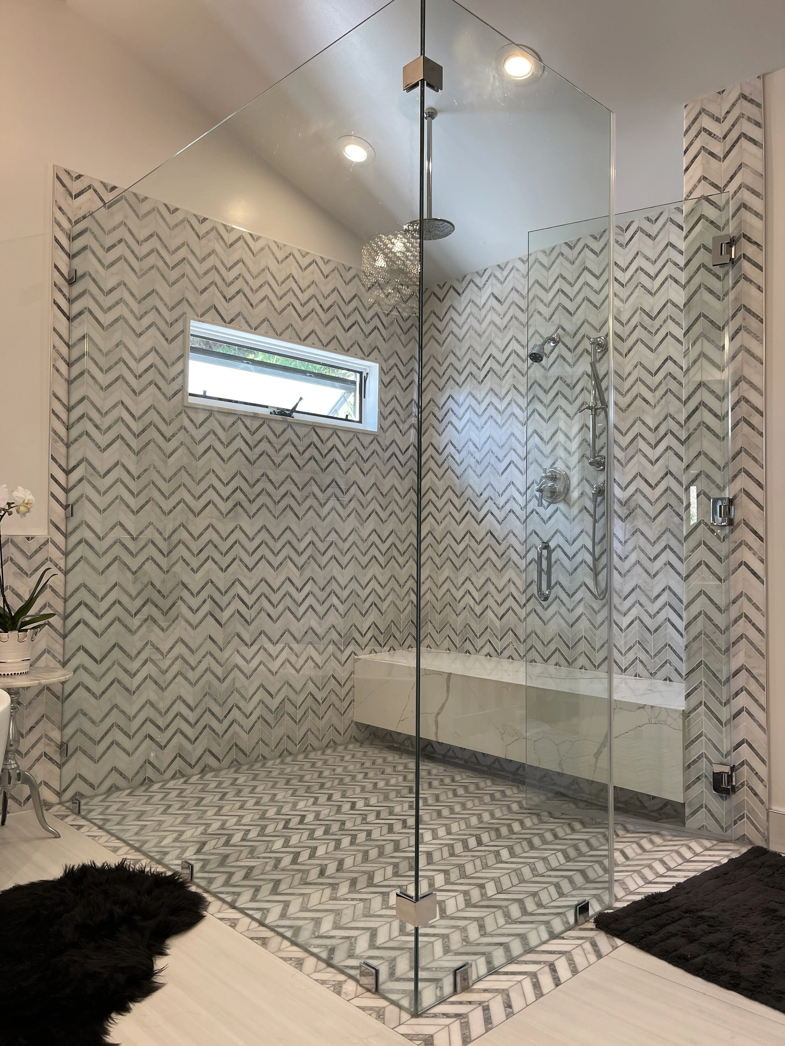  Curbless shower with a floating bench completes this spa - like retreat 