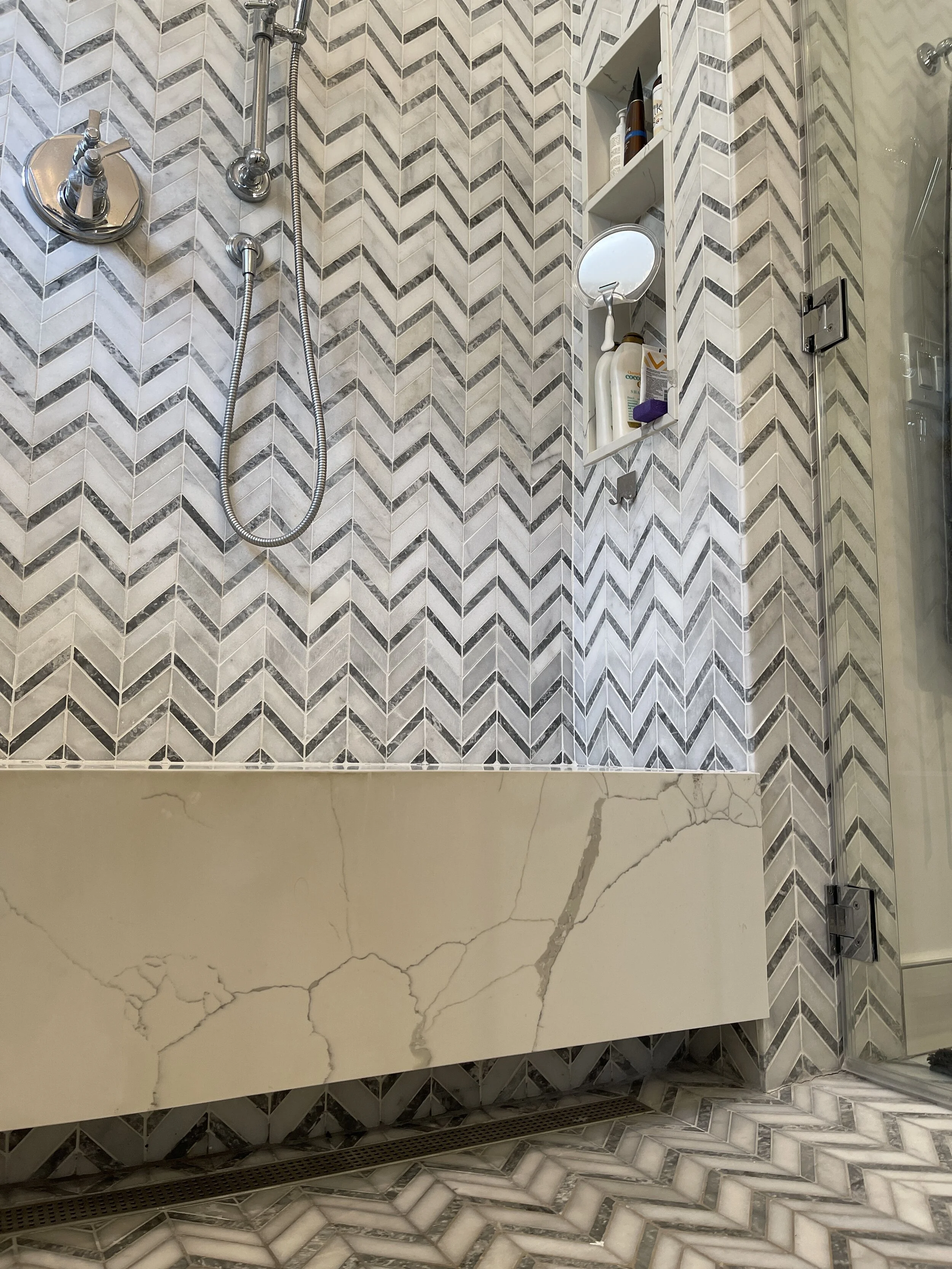  A hidden soap niche provides for “out of sight” storage 