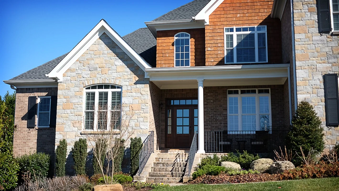 Exterior white trim on brick home - Residential painting by Nash Painting Nashville TN