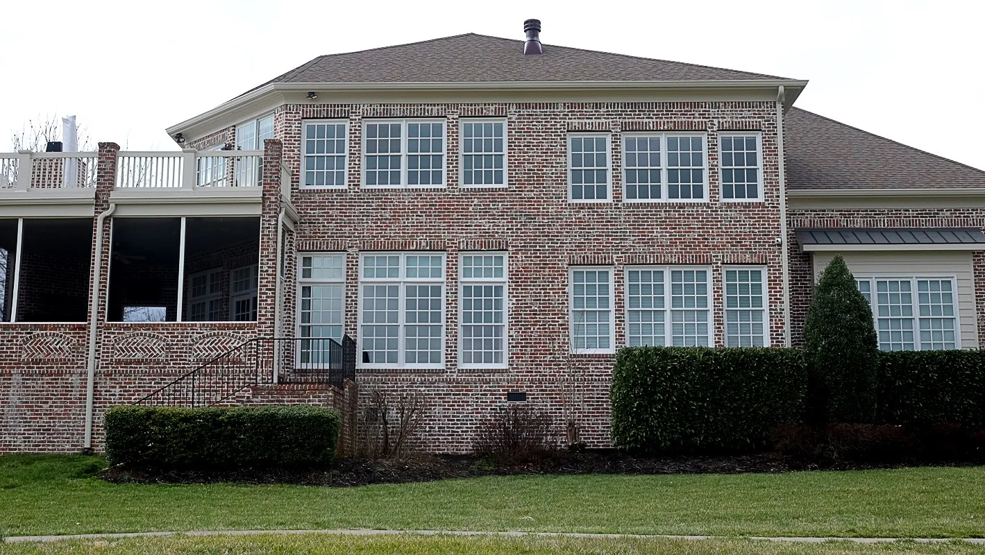 Exterior trim painting on a brick home - Residential painting by Nash Painting Nashville TN
