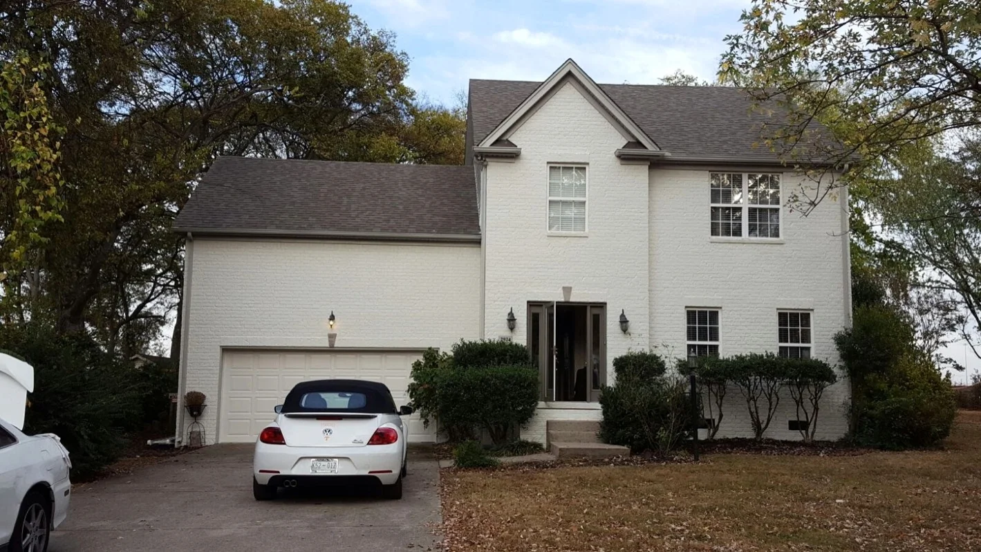 Exterior white paint on brick - Residential painting by Nash Painting Nashville TN