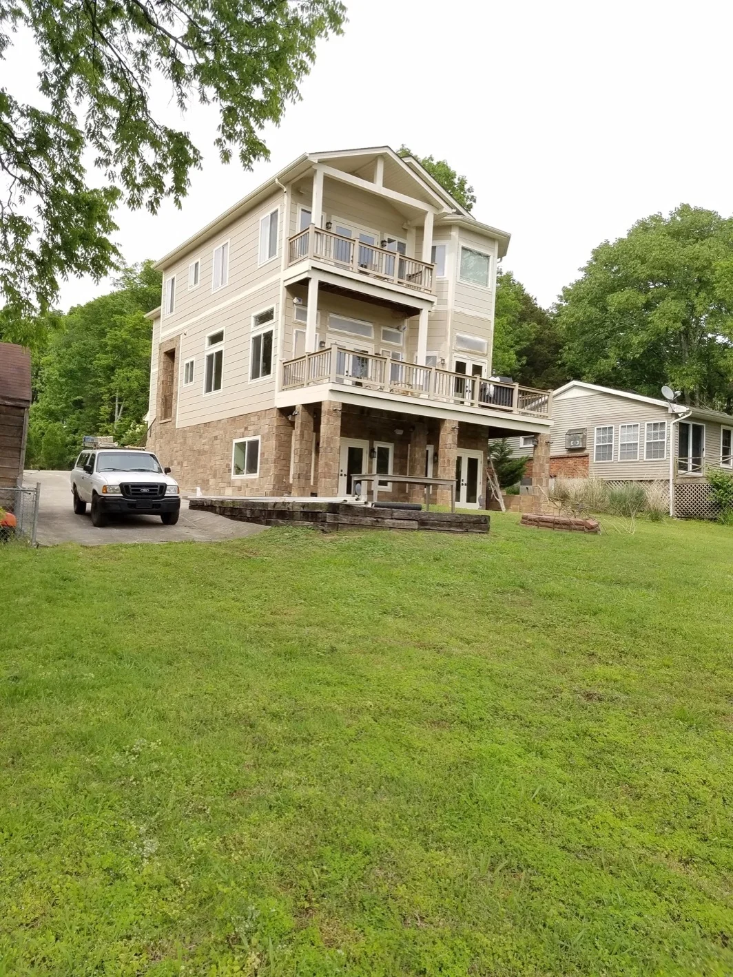 Exterior light tan wooden siding - Residential painting by Nash Painting Nashville TN