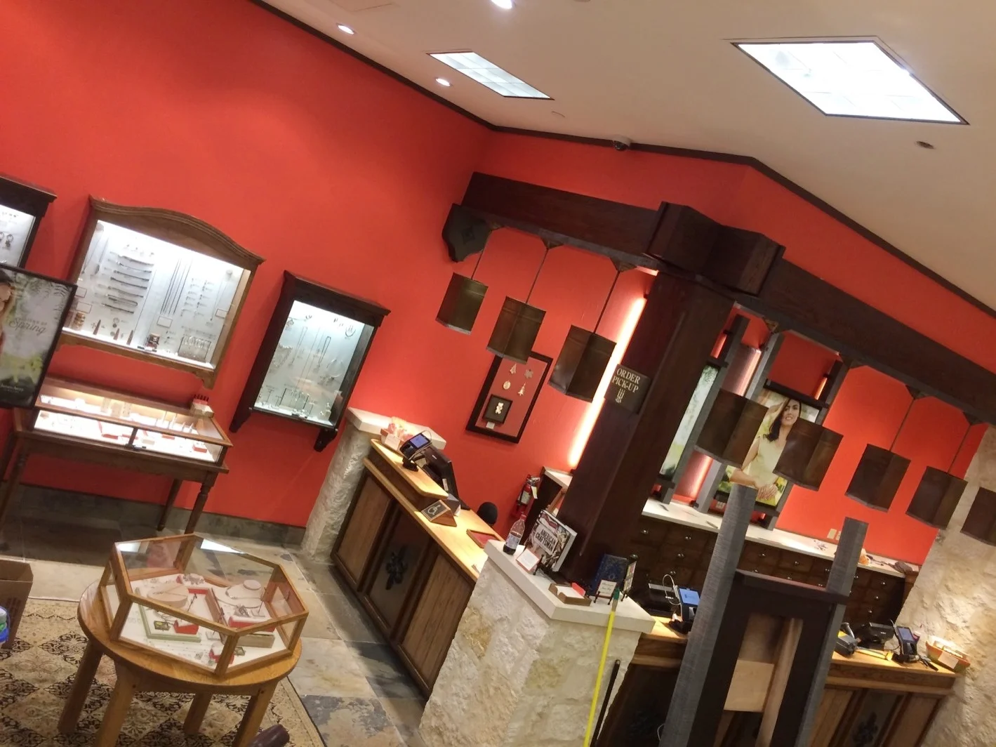 Red store with black trim on display cases - Residential painting by Nash Painting Nashville TN