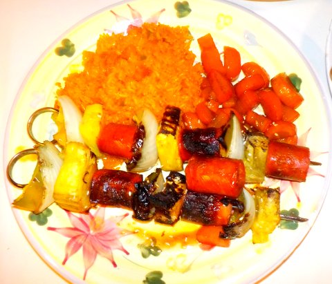 Chirizo shishkabobs served with coconut rice and honey glazed carrots