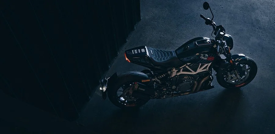 Indian Motorcycle FTR x 100% collaboration photographed in a dark studio