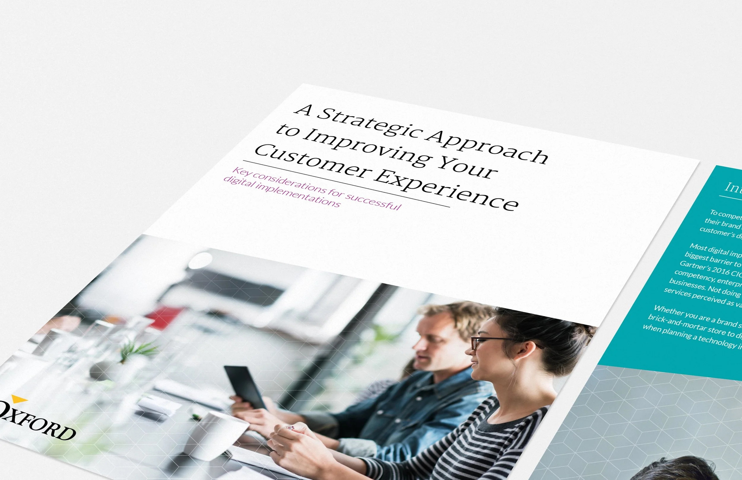 Brochure titled 'A strategic Approach to Improving Your Customer Experience' with a photo of two people working on tablets at a table in an office setting.