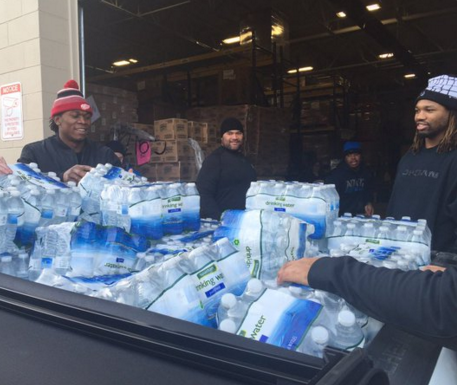 Teammates deliver water to Flint, Michigan