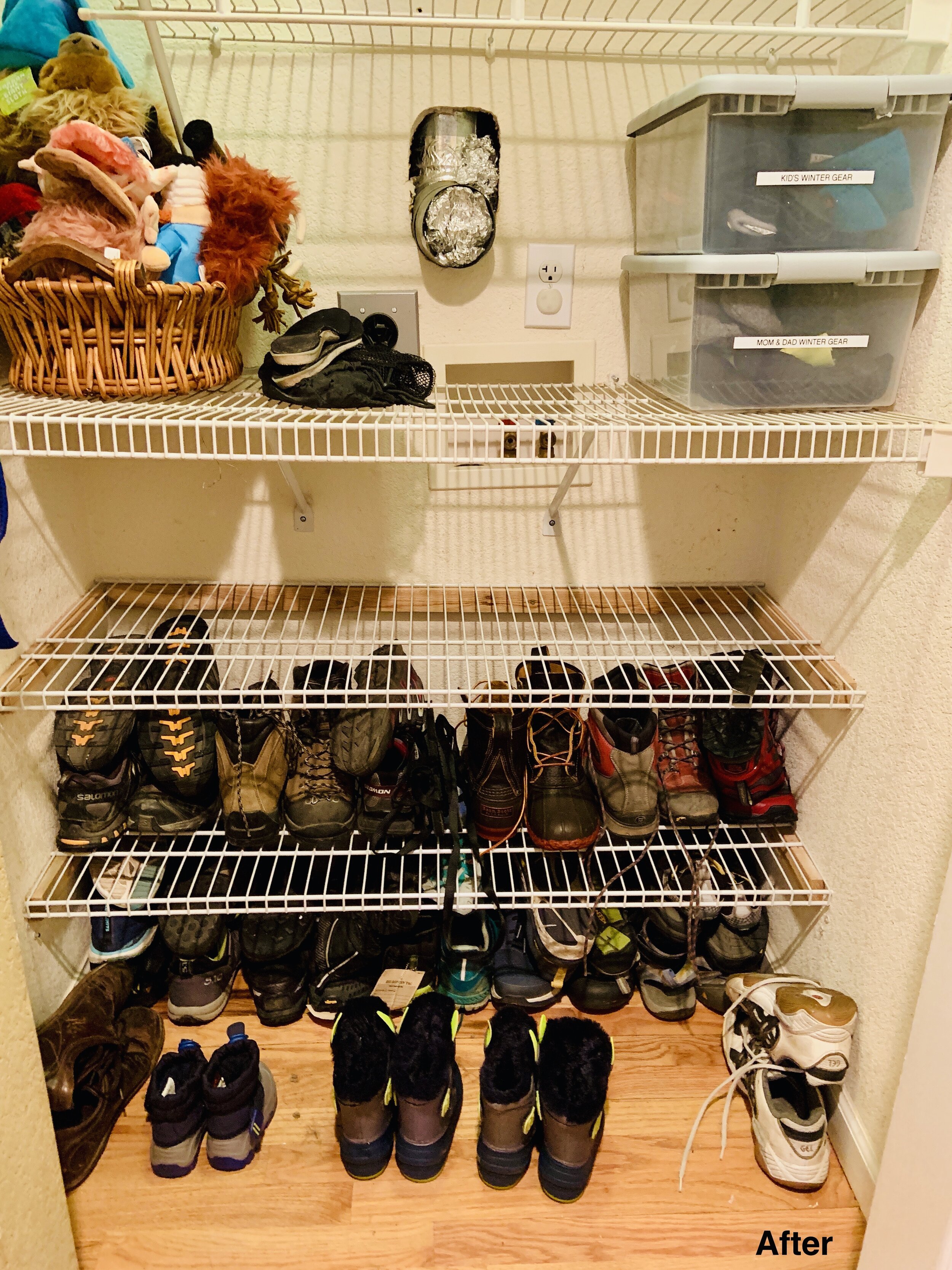 Boulder entryway closer with white wired shelves organized with containers that are labeled, dog toys in basket, shoes on shelves