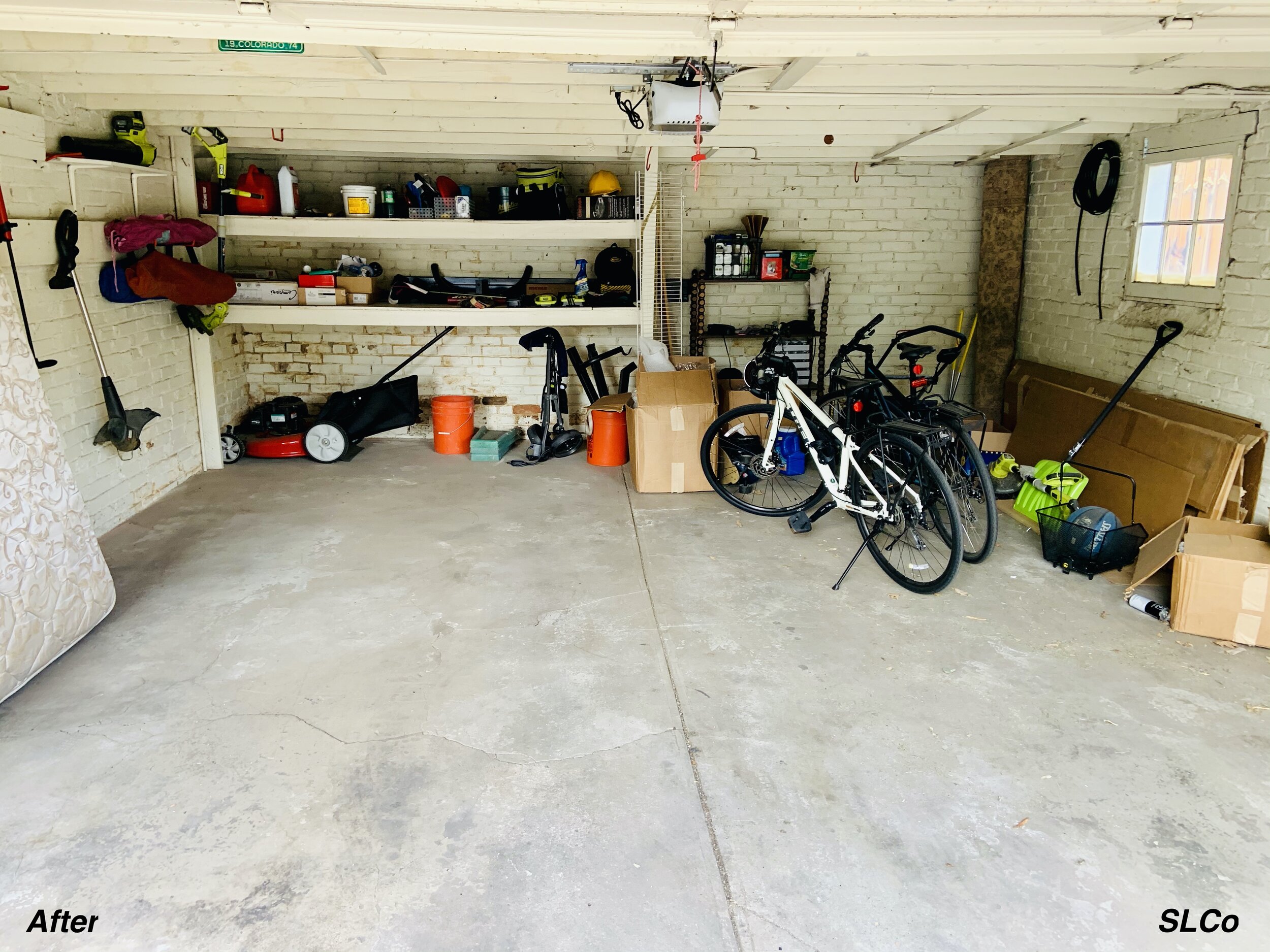 After photo of garage with bikes neatly placed, and shelves more clear