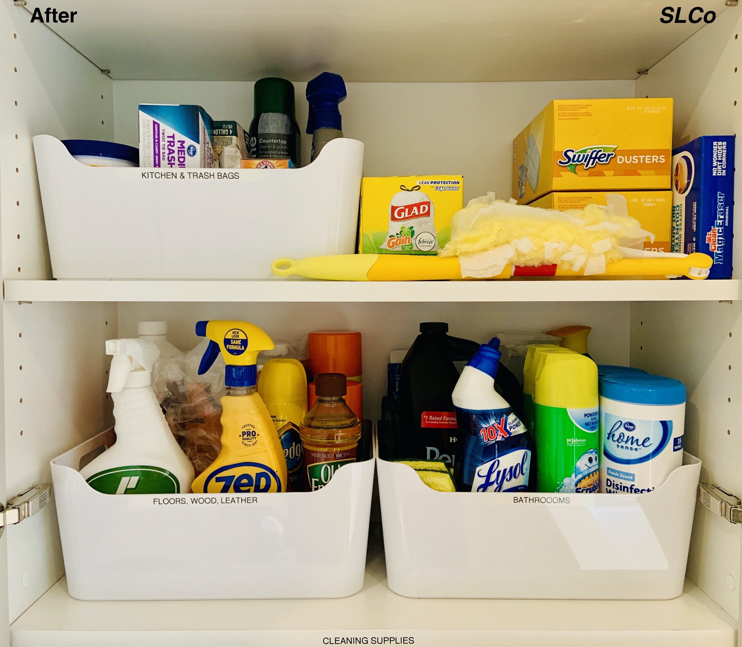 Close up of laundry room, two shelves, with white labeled containers with cleaning supplies in two containers, swiffer to the side, and lotions in another.