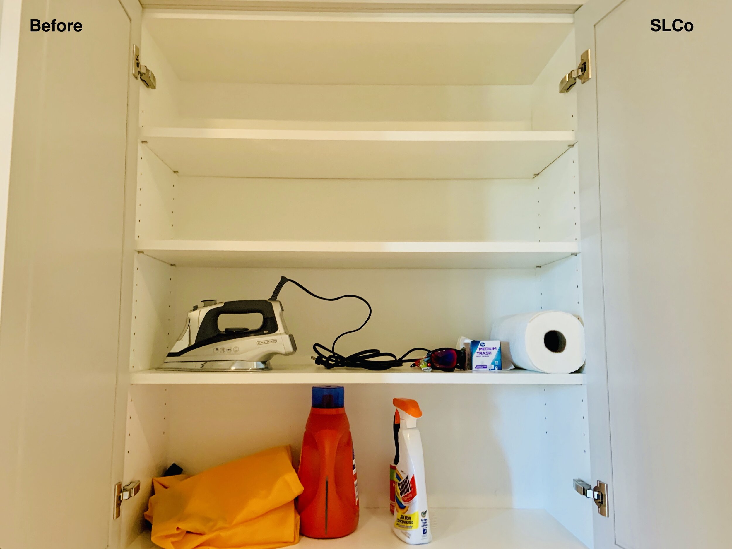 Laundry room cupboard with 4 white shelves, 2 laundry detergent containers and an iron