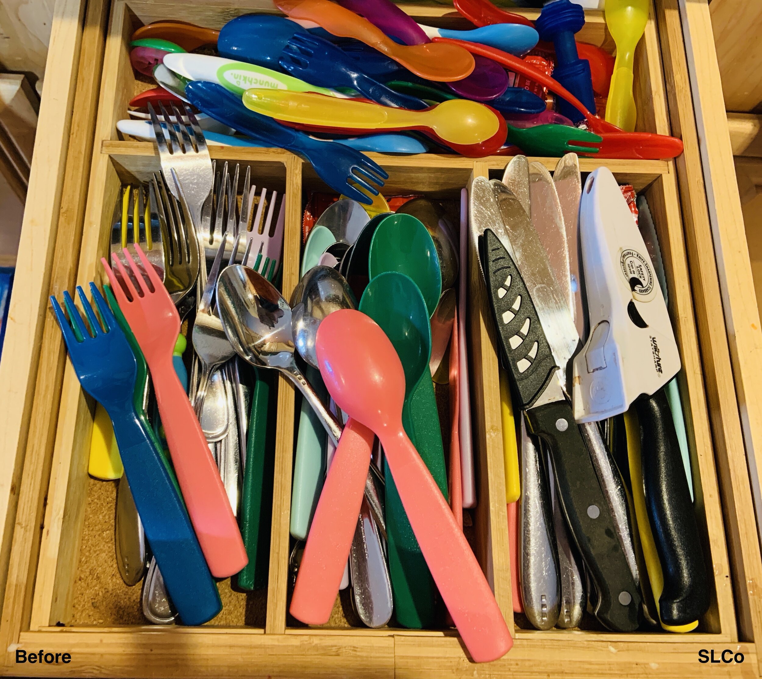 Kitchen silverware drawer with silverware everywhere