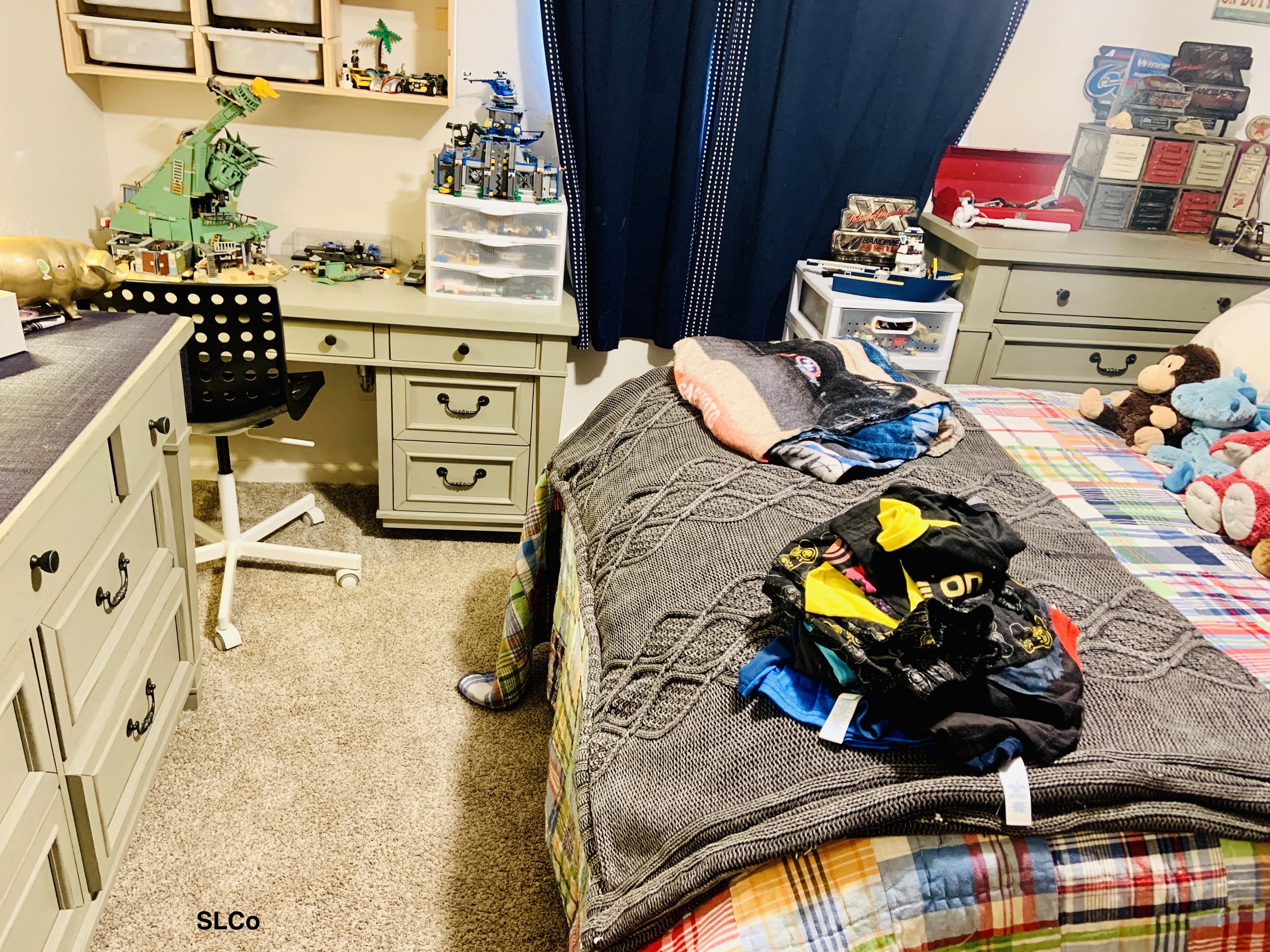 Dressed drawers closed and floor clear in kids room