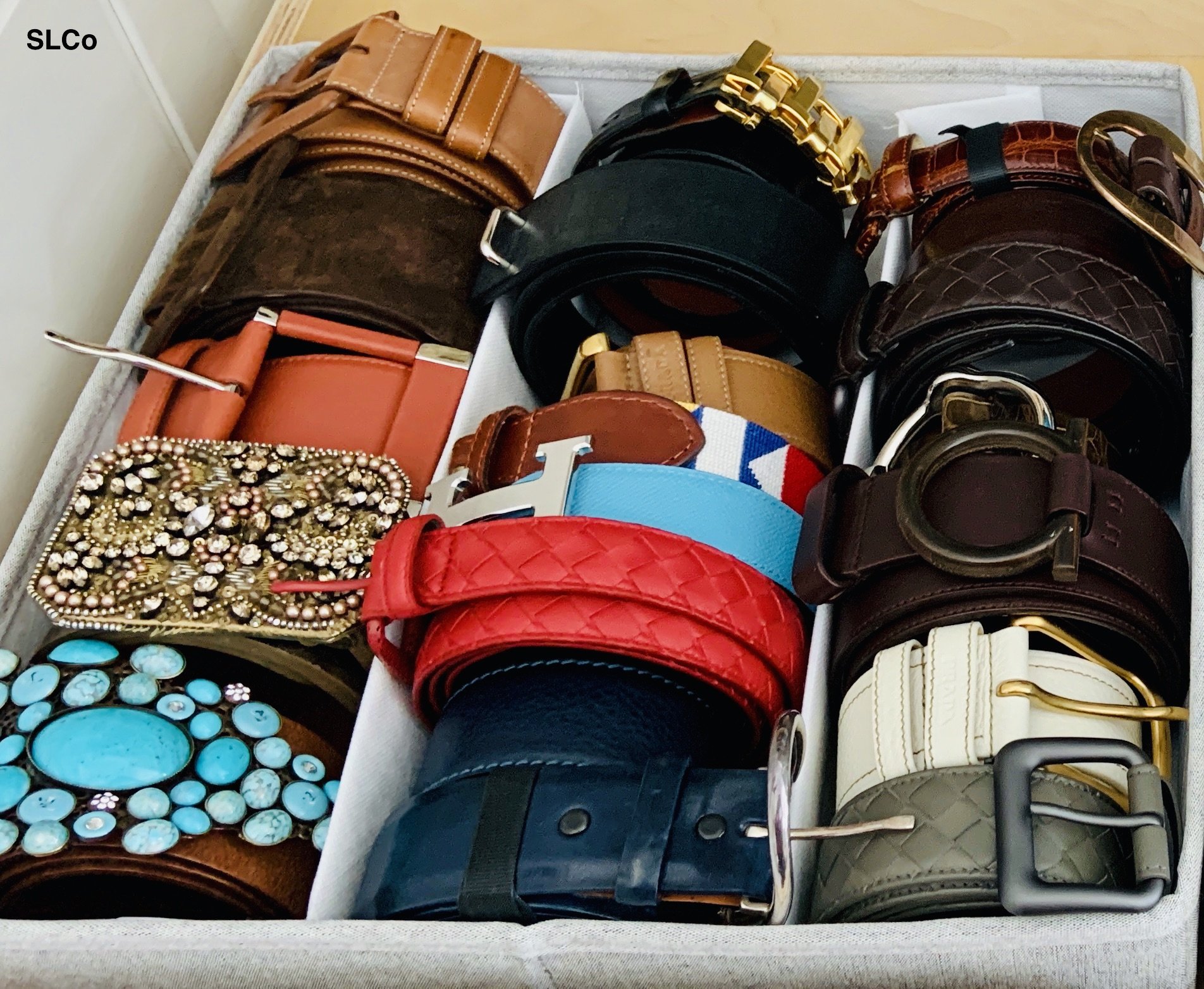 Cherry Hills Closet with belts organized in a container