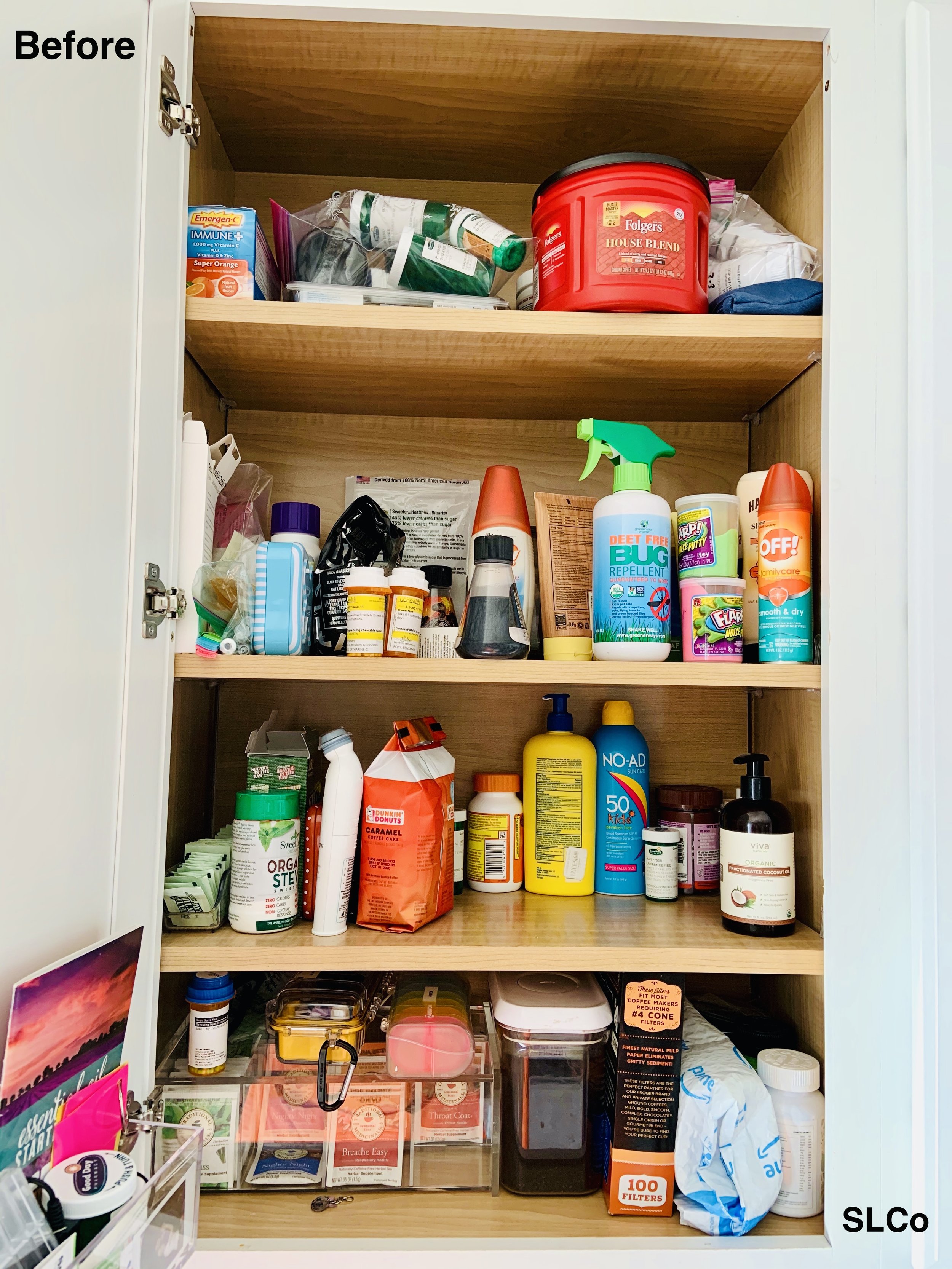 Large kitchen cabinet with kitchen items scattered