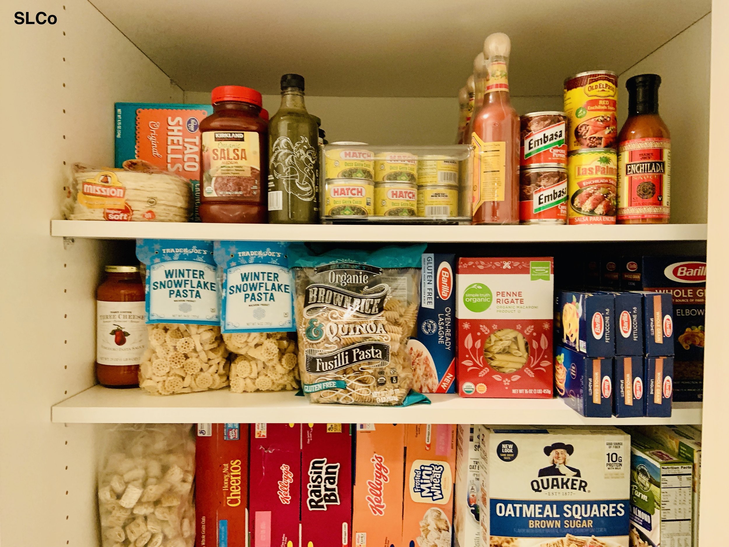 Kitchen pantry 3 shelves with organized noodles