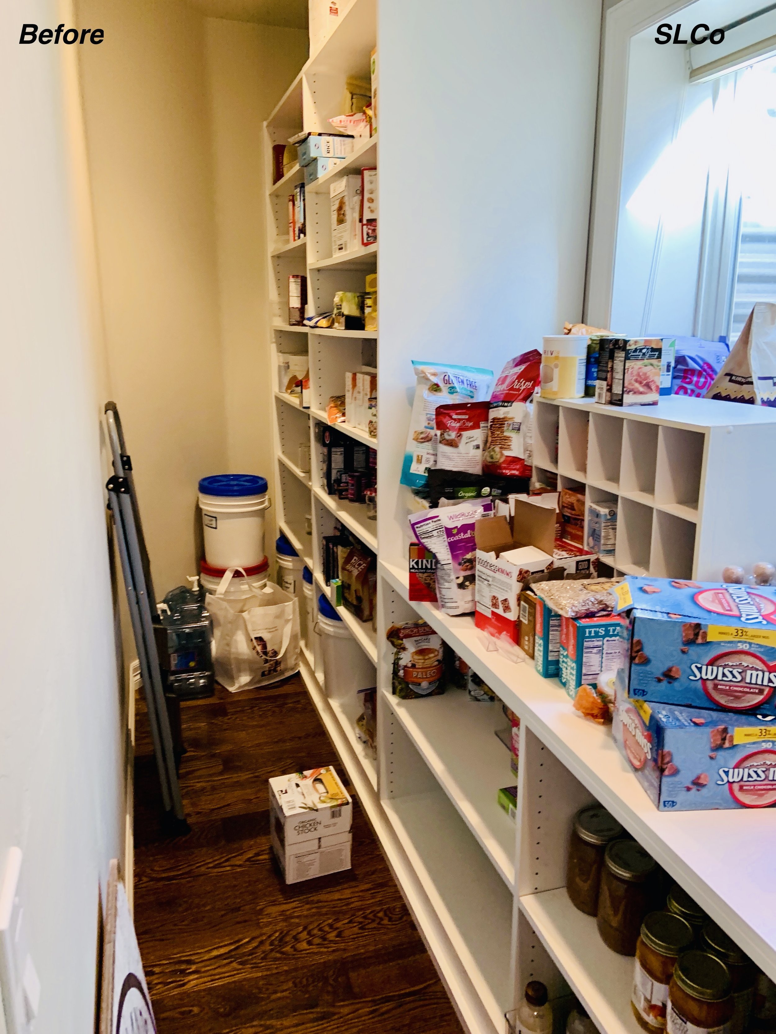 Large kitchen pantry with items on floor and items on counter