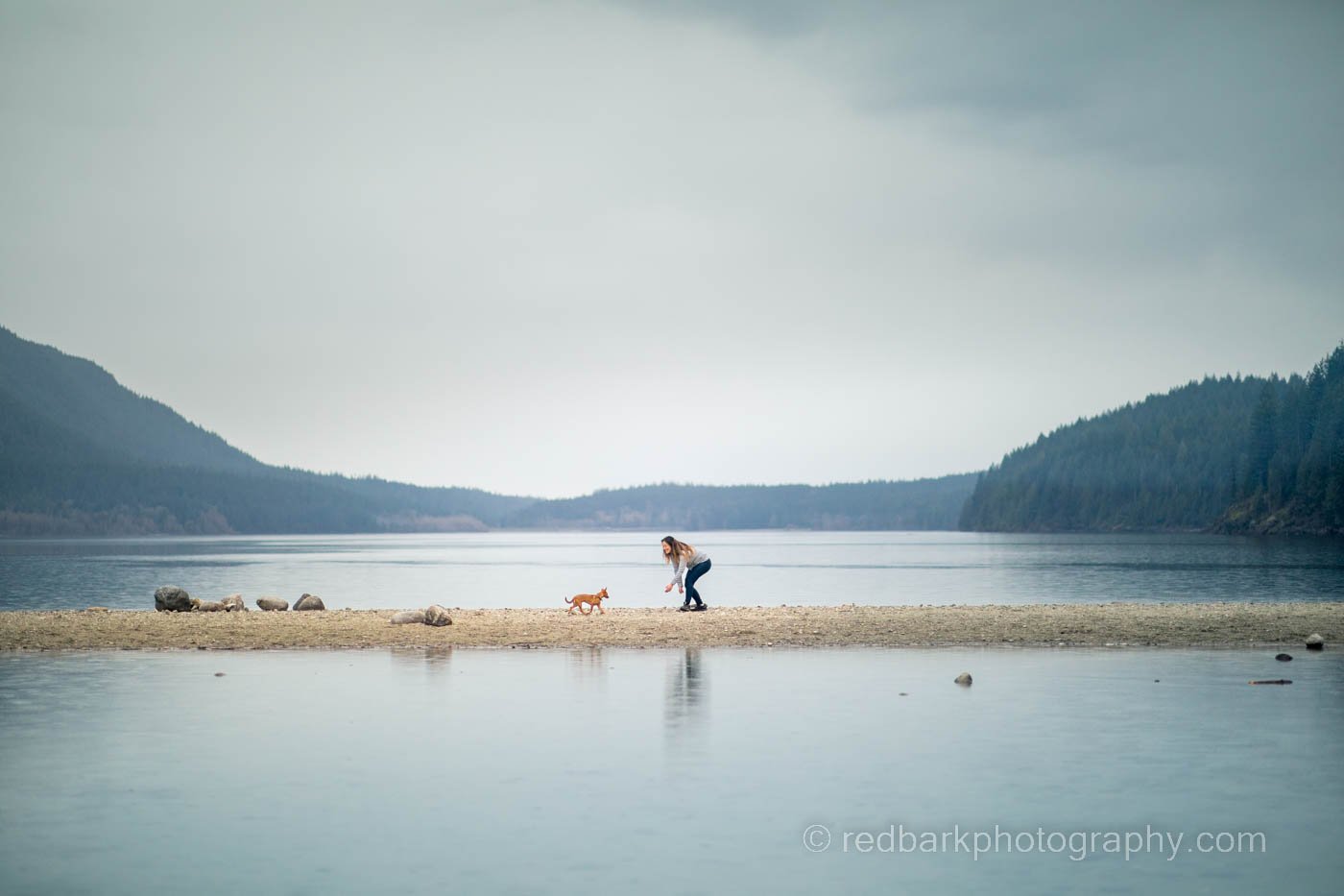 Woman and chihuahua rescue mix river